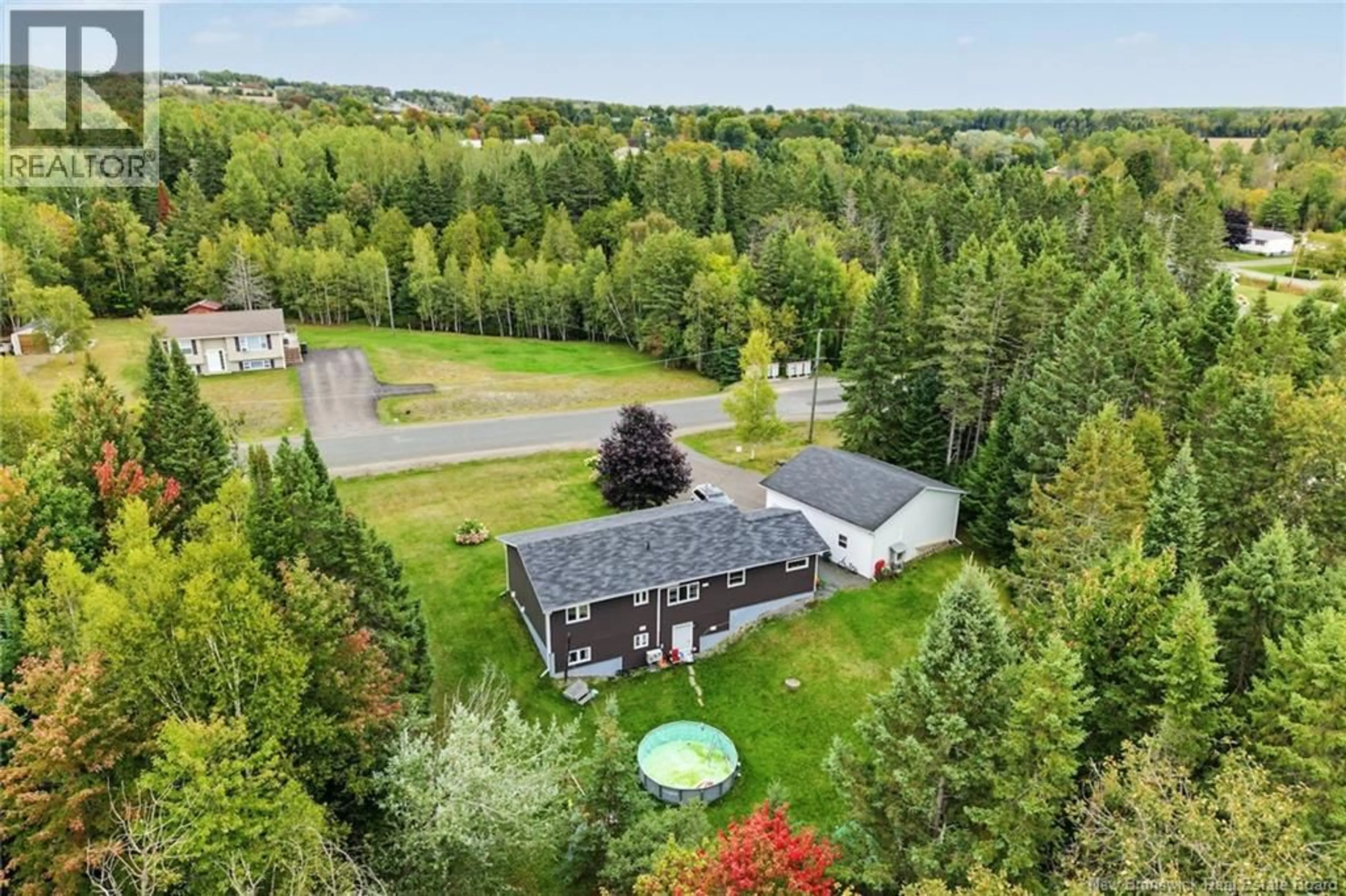 A pic from outside/outdoor area/front of a property/back of a property/a pic from drone, water/lake/river/ocean view for 15 BRENTWOOD, Newbridge New Brunswick E7N1J5
