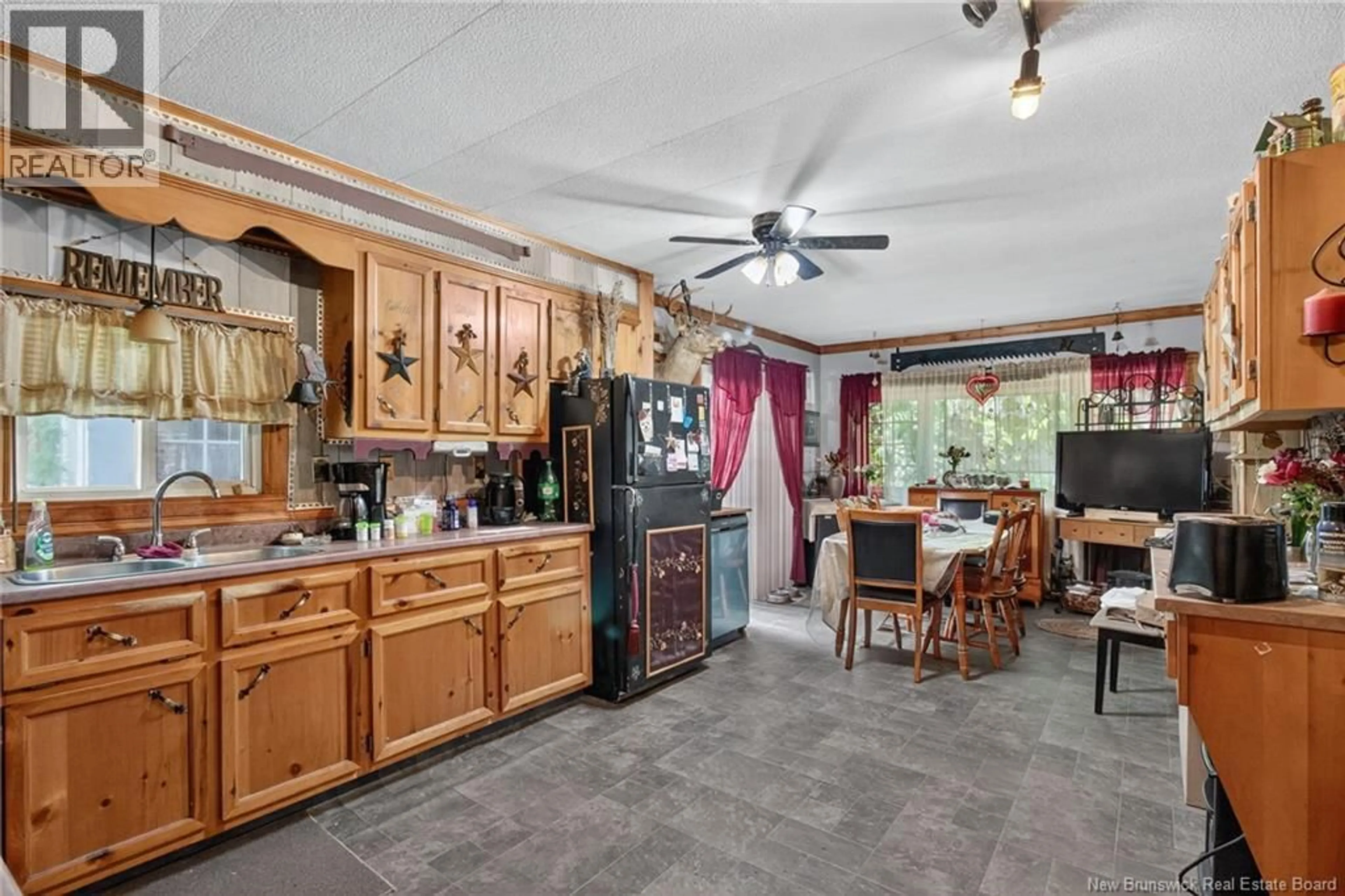 Open concept kitchen, ceramic/tile floor for 255 NIAGARA ROAD, Pine Glen New Brunswick E1J1J2