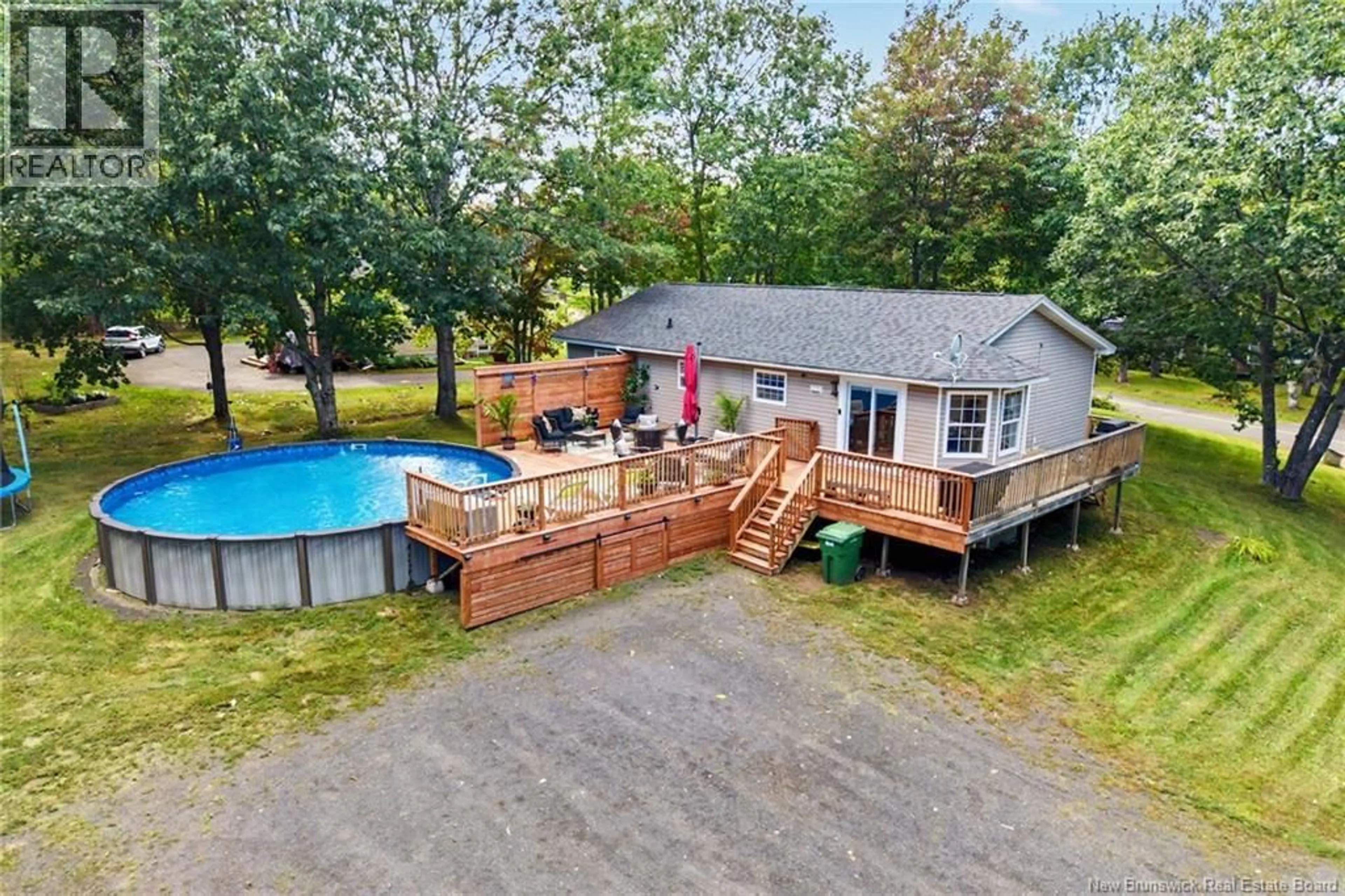 A pic from outside/outdoor area/front of a property/back of a property/a pic from drone, water/lake/river/ocean view for 51 UPTON STREET, Minto New Brunswick E4B2P4