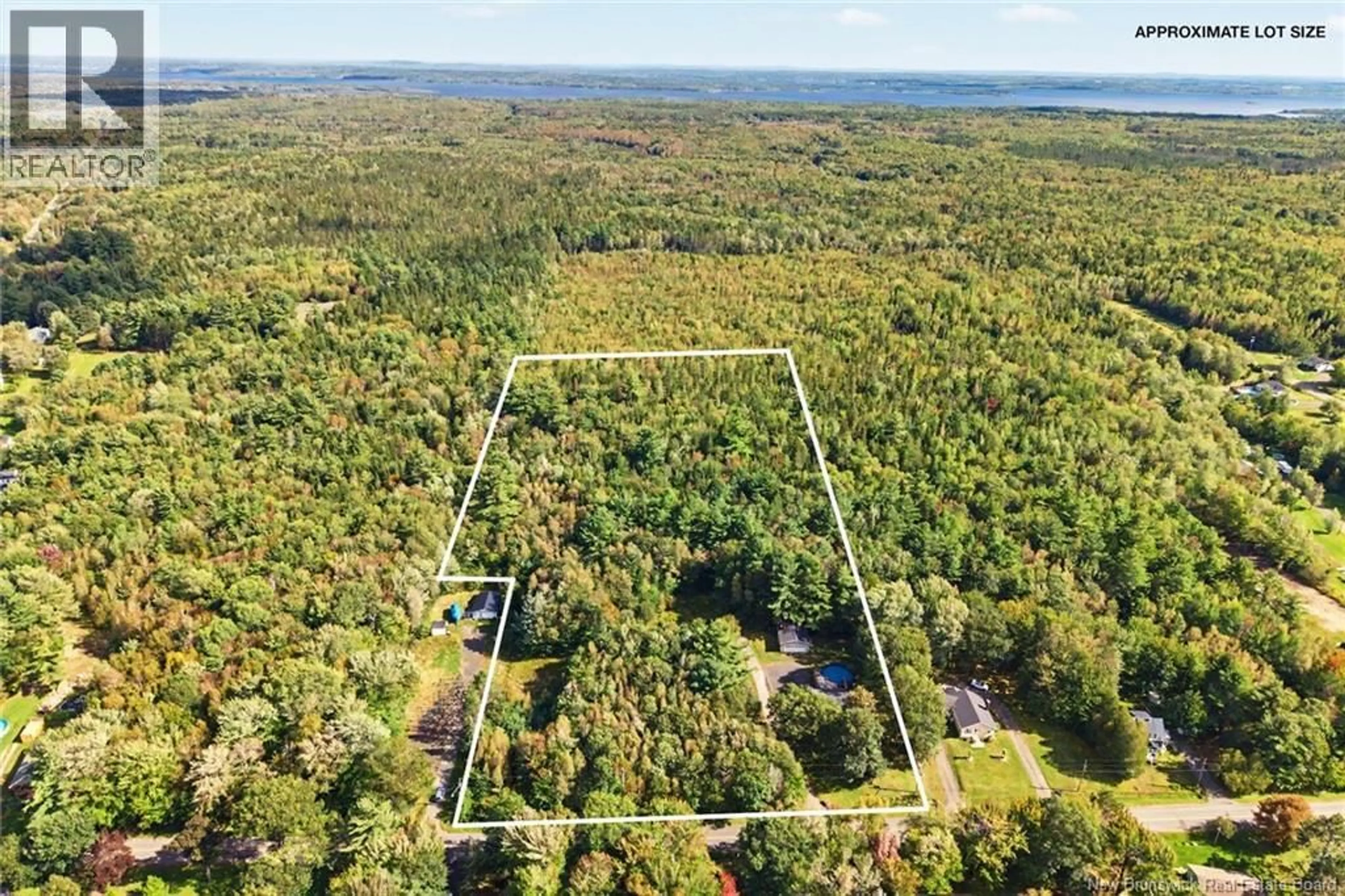 A pic from outside/outdoor area/front of a property/back of a property/a pic from drone, forest/trees view for 51 UPTON STREET, Minto New Brunswick E4B2P4