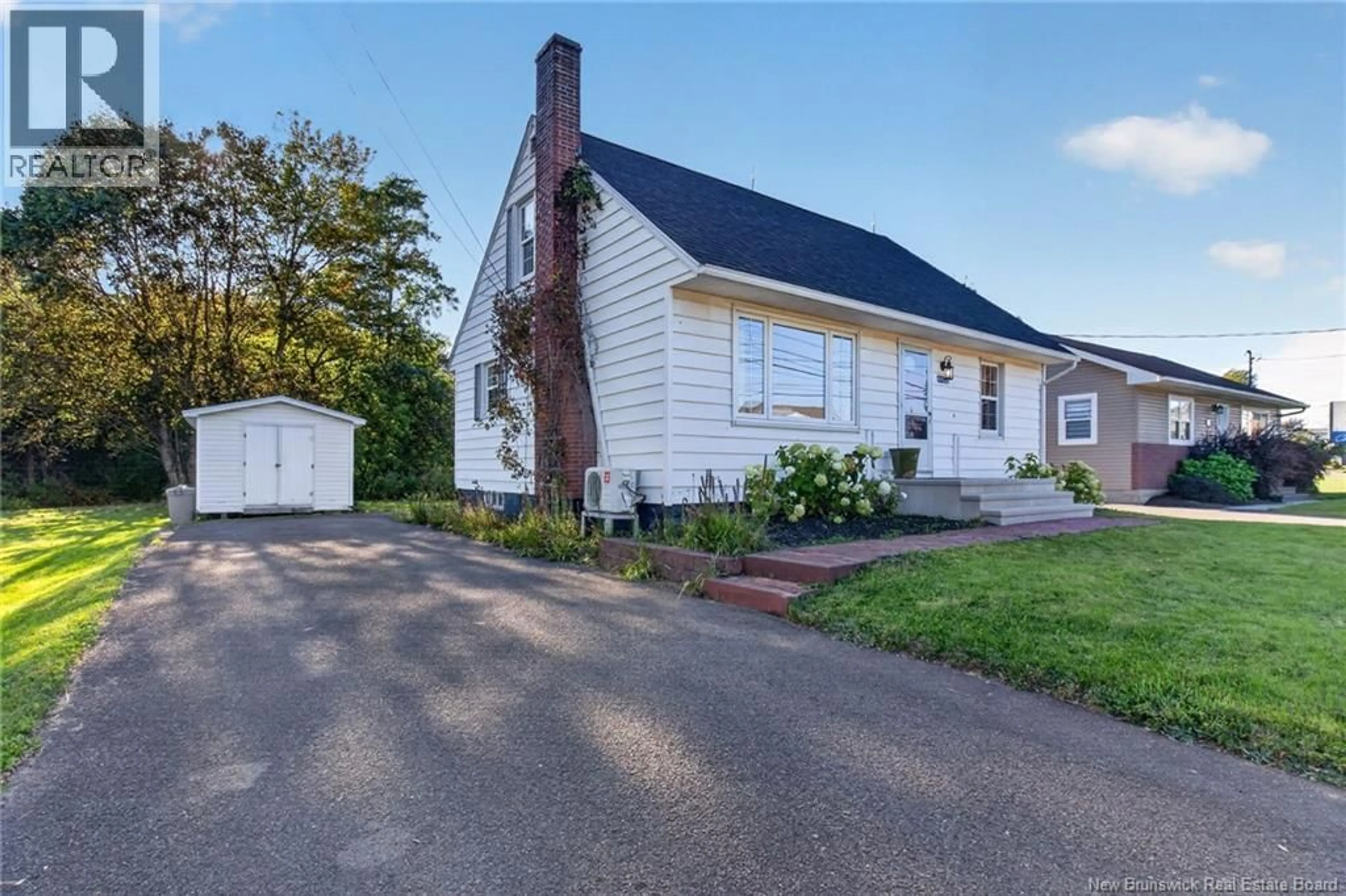 Home with vinyl exterior material, street for 4482 RUE PRINCIPALE STREET, Saint-Antoine New Brunswick E4V1P9