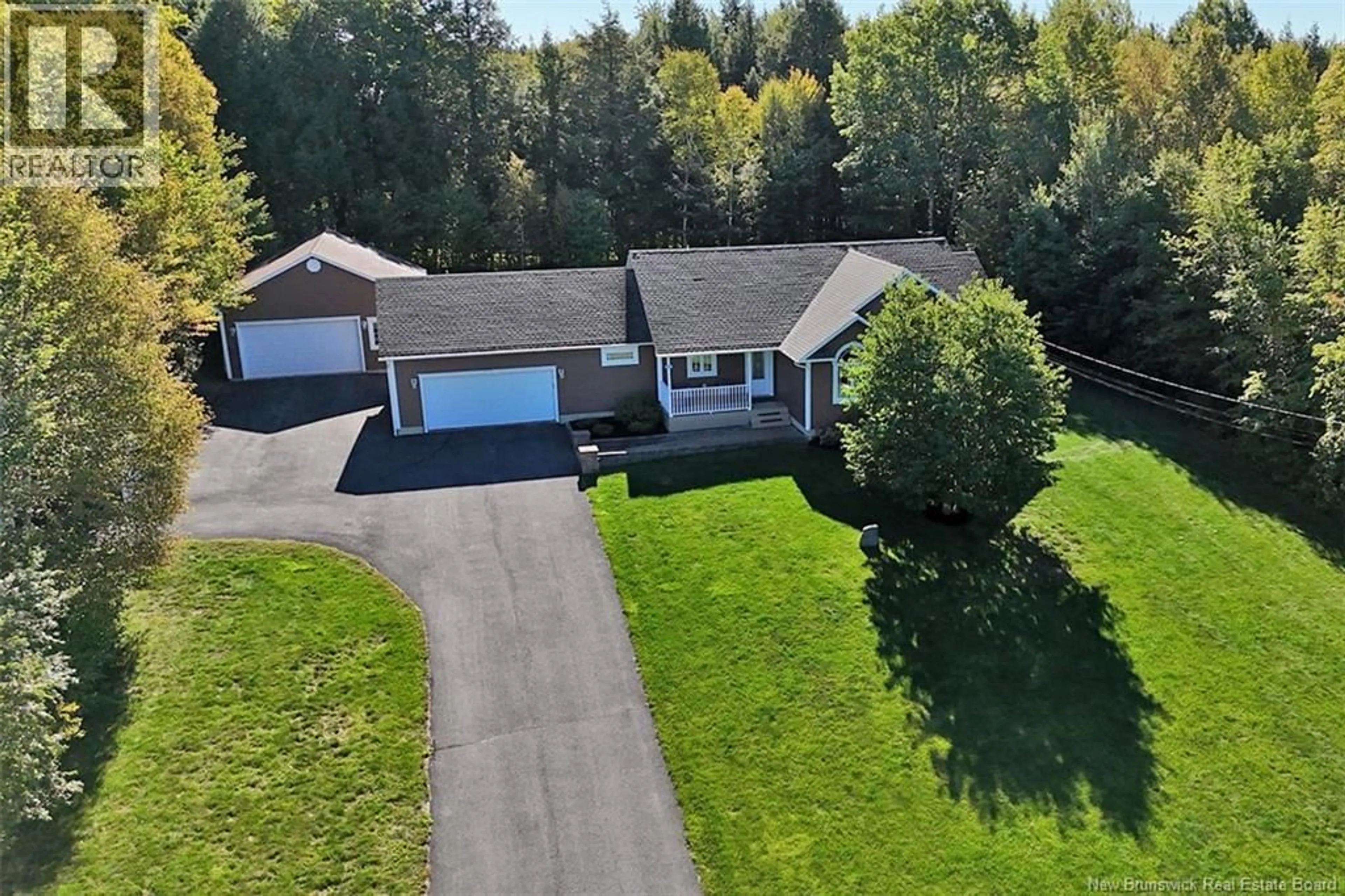 A pic from outside/outdoor area/front of a property/back of a property/a pic from drone, unknown for 168 COUNTRY WOOD LANE, Fredericton New Brunswick E3A0Y6