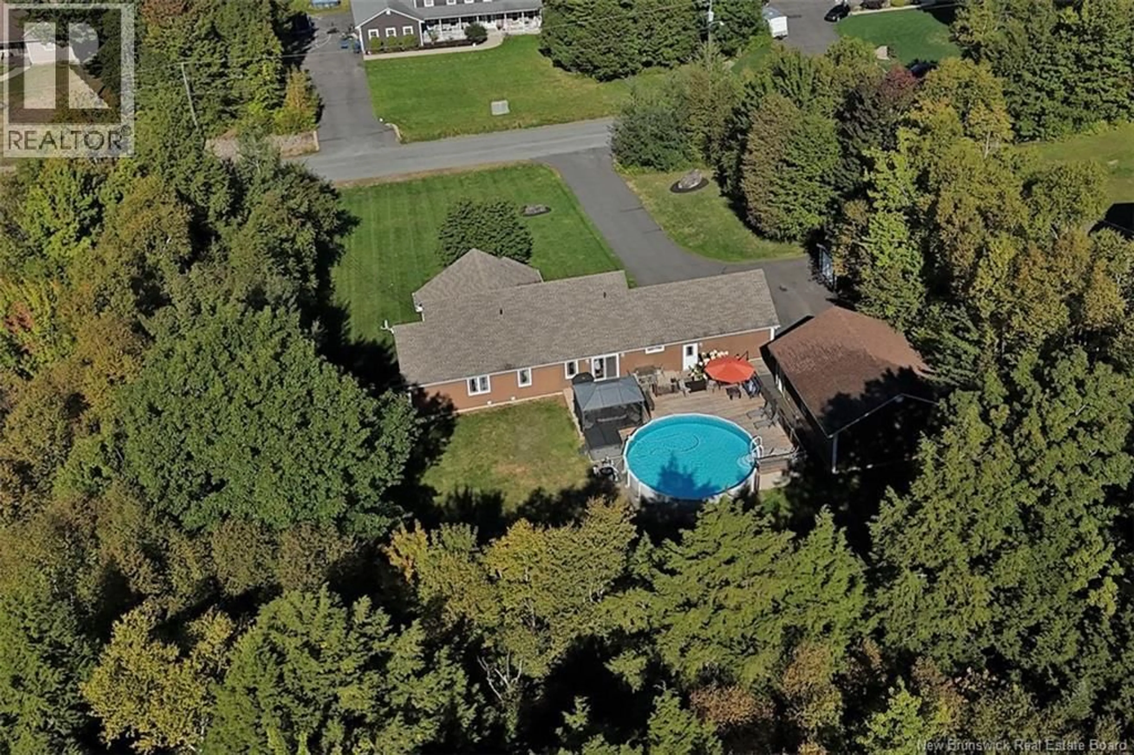 A pic from outside/outdoor area/front of a property/back of a property/a pic from drone, unknown for 168 COUNTRY WOOD LANE, Fredericton New Brunswick E3A0Y6