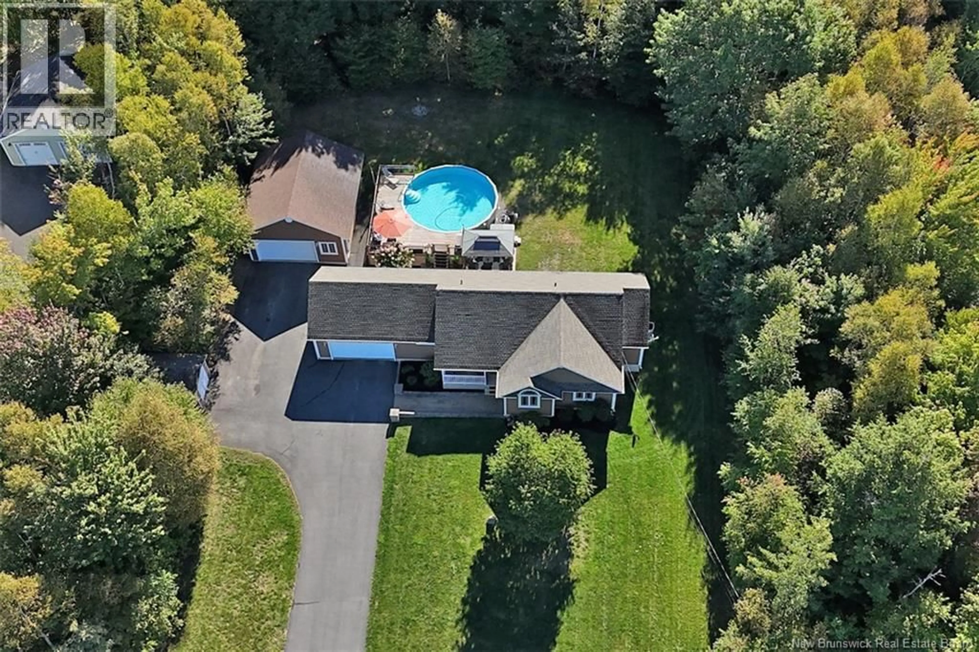 A pic from outside/outdoor area/front of a property/back of a property/a pic from drone, water/lake/river/ocean view for 168 COUNTRY WOOD LANE, Fredericton New Brunswick E3A0Y6