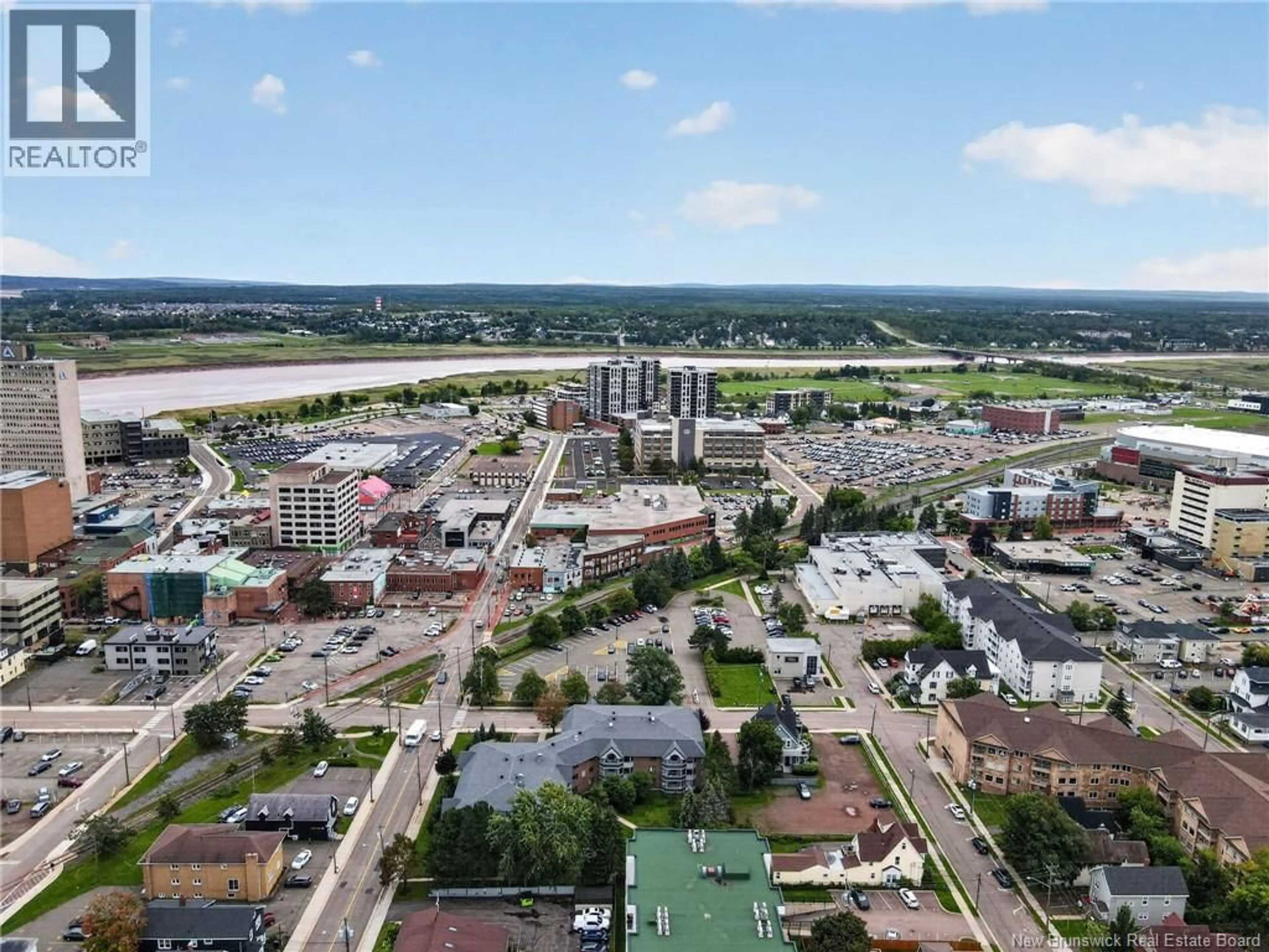 A pic from outside/outdoor area/front of a property/back of a property/a pic from drone, city buildings view from balcony for 305/307 - 191 QUEEN, Moncton New Brunswick E1C1L3