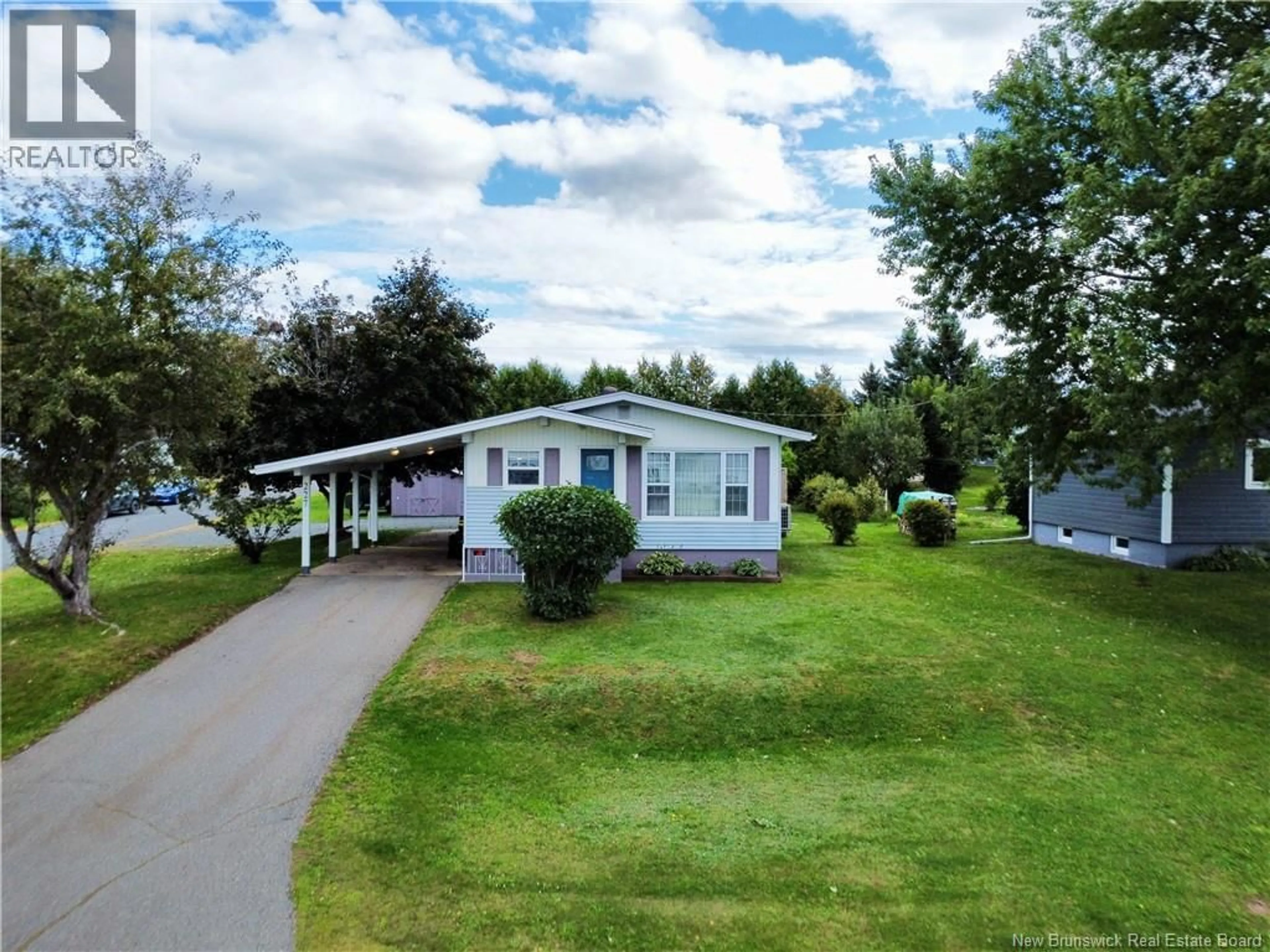 Home with vinyl exterior material, street for 227 FRANCINE, Beresford New Brunswick E8K1N6