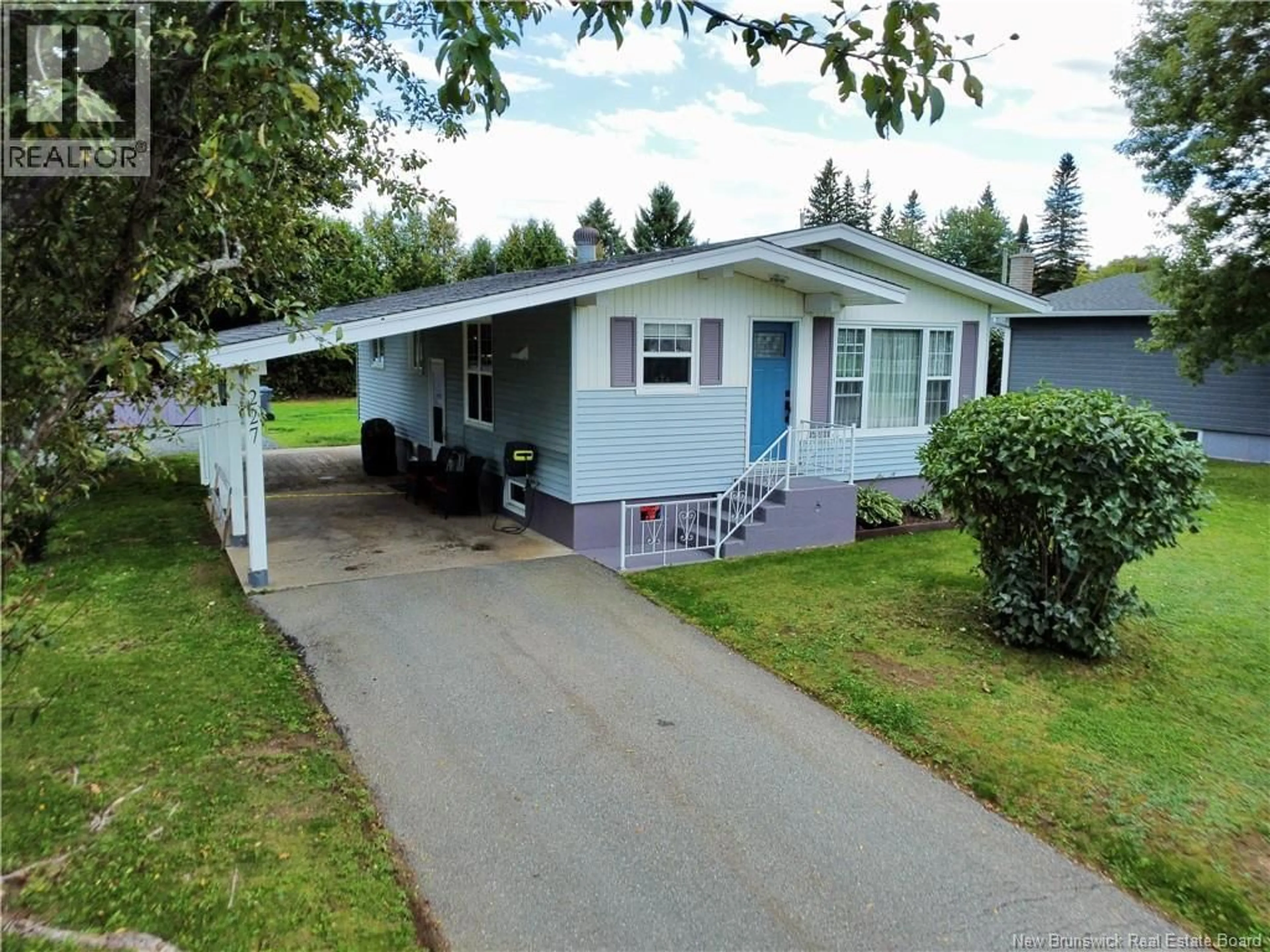 Home with vinyl exterior material, street for 227 FRANCINE, Beresford New Brunswick E8K1N6