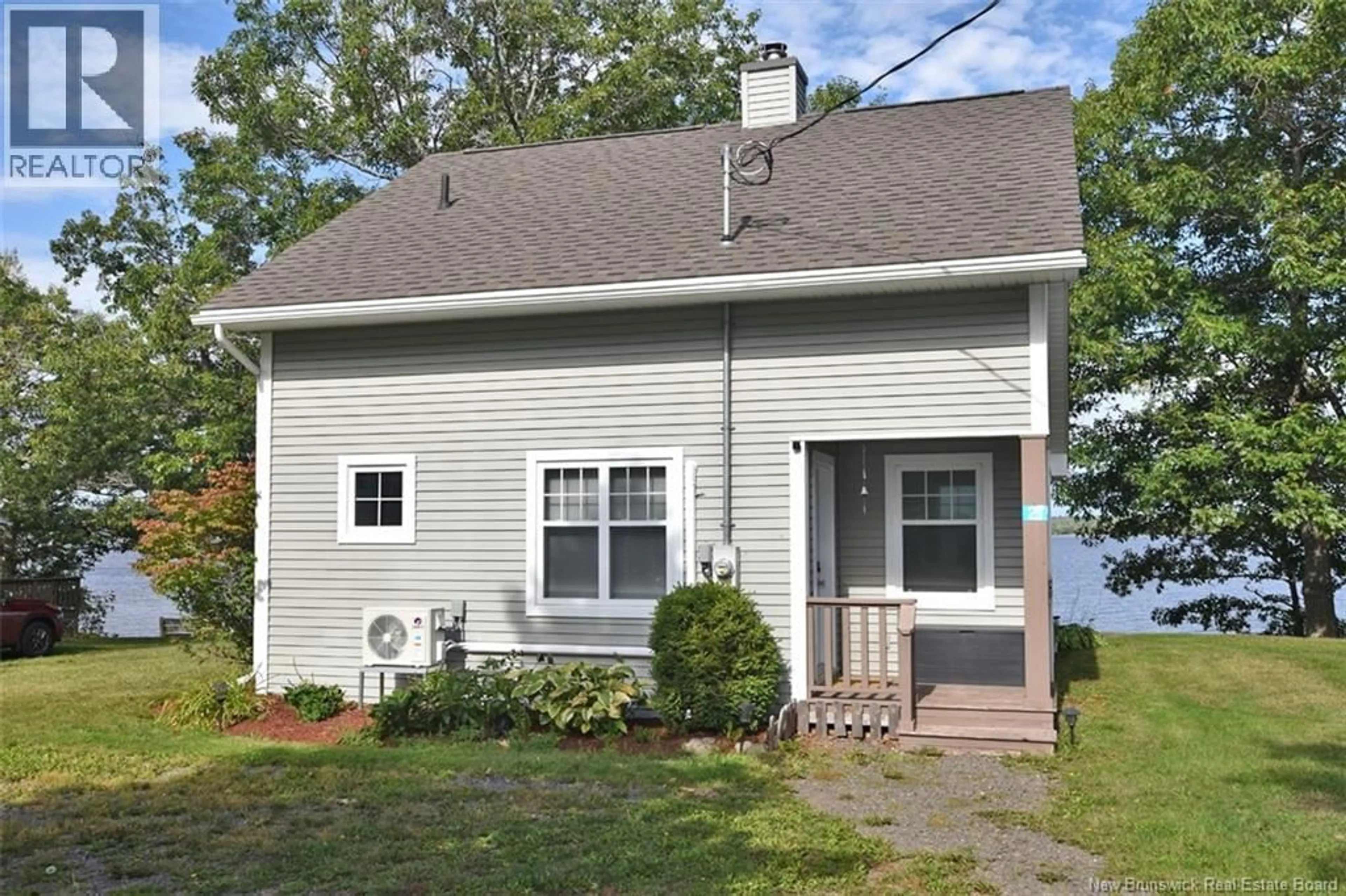 Home with vinyl exterior material, street for 21 FARM HOUSE LANE, Douglas Harbour New Brunswick E4B4B9
