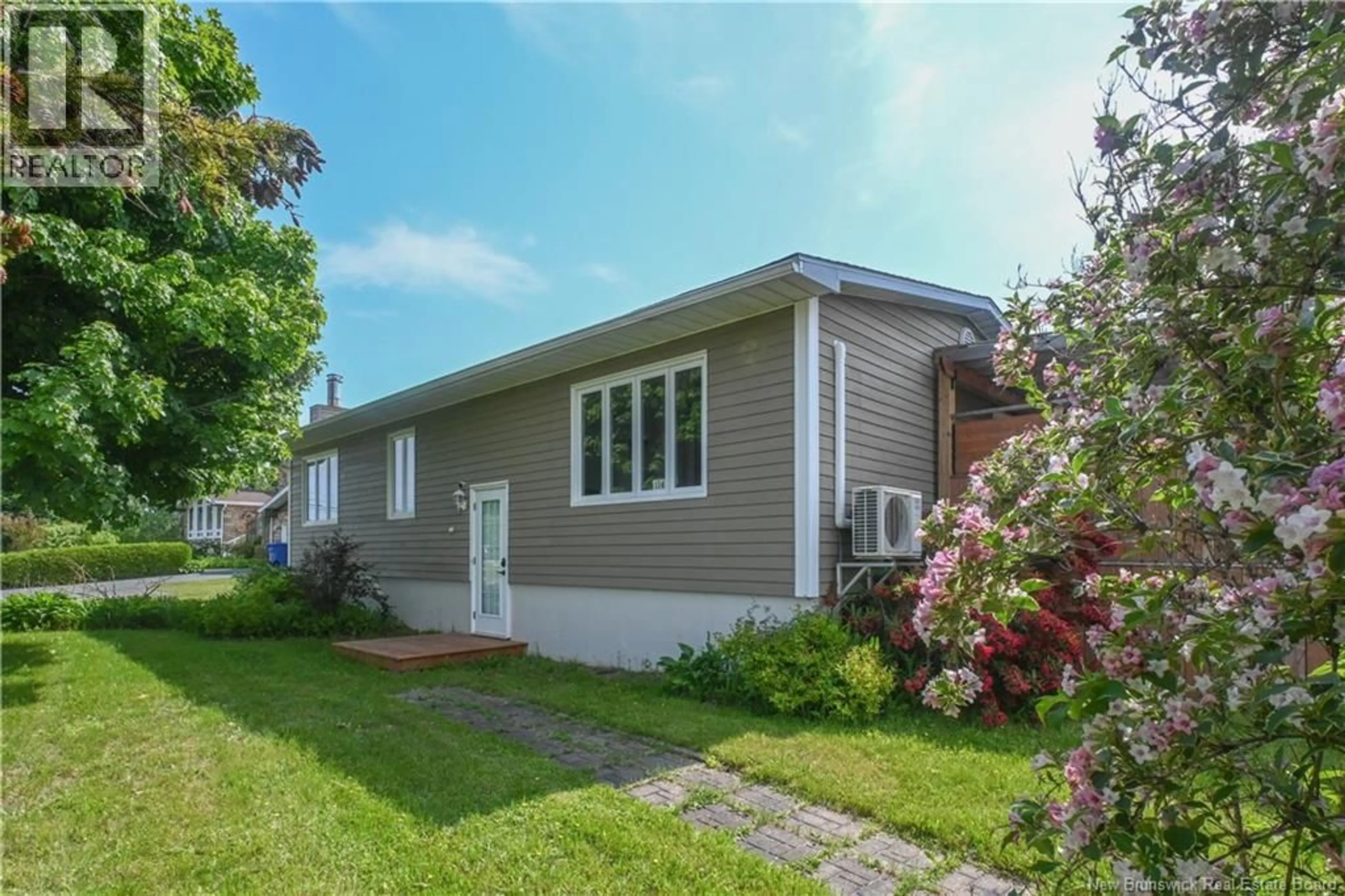 Home with vinyl exterior material, street for 174 BELLEFEUILLE STREET, Shippagan New Brunswick E8S1G7