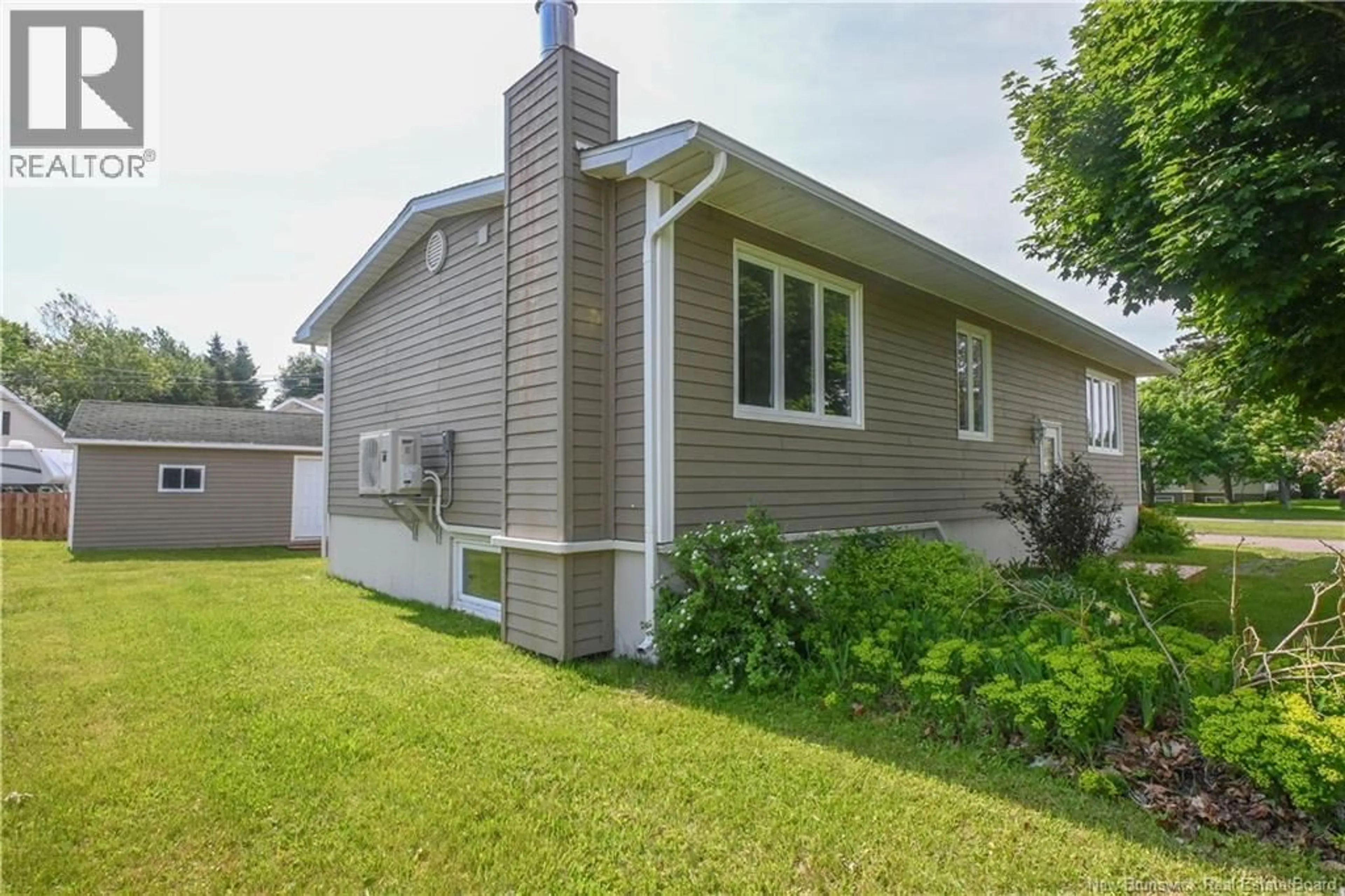 Home with vinyl exterior material, street for 174 BELLEFEUILLE STREET, Shippagan New Brunswick E8S1G7