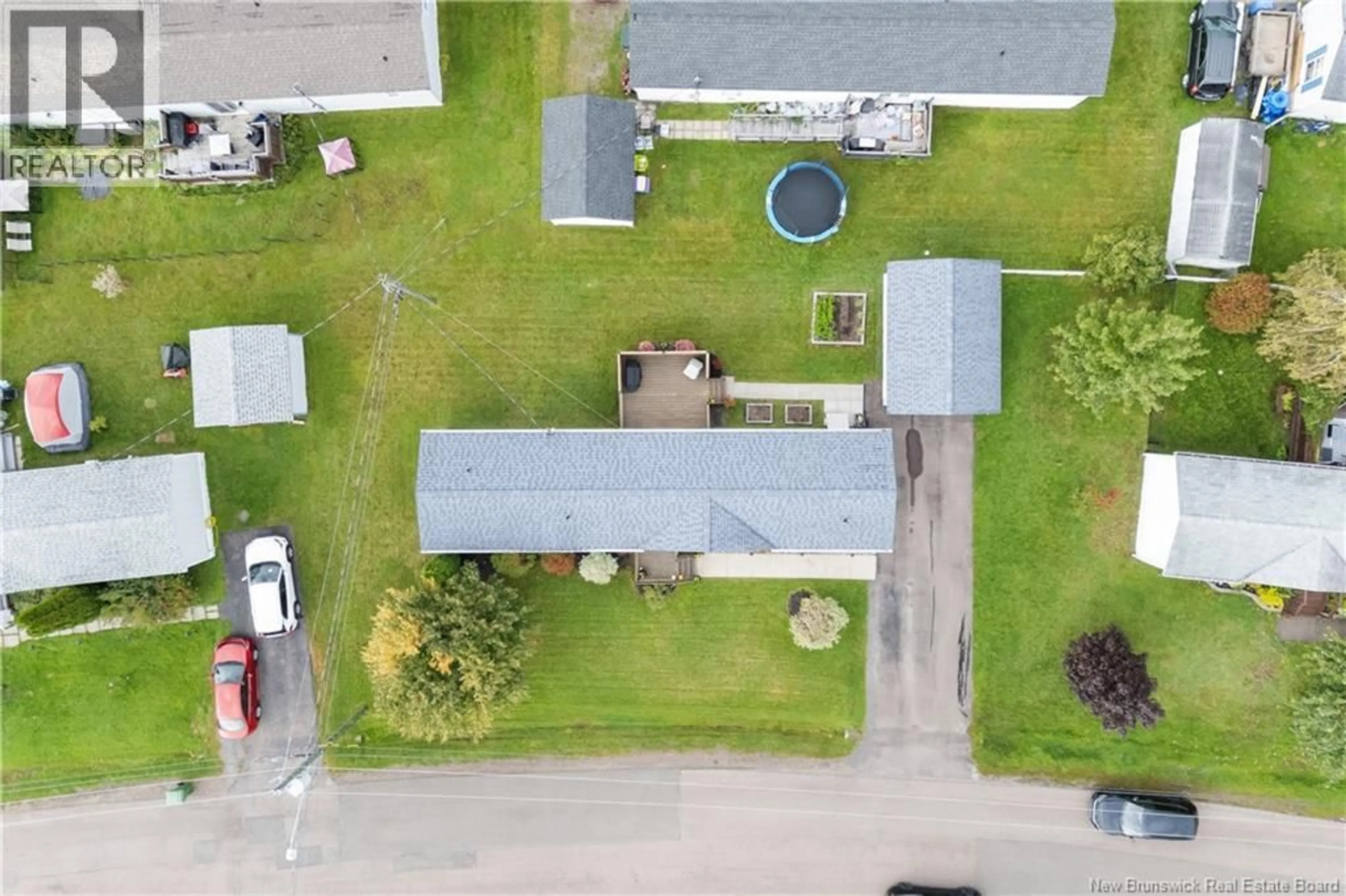 A pic from outside/outdoor area/front of a property/back of a property/a pic from drone, street for 7 PERILLA STREET, Moncton New Brunswick E1H2Z1