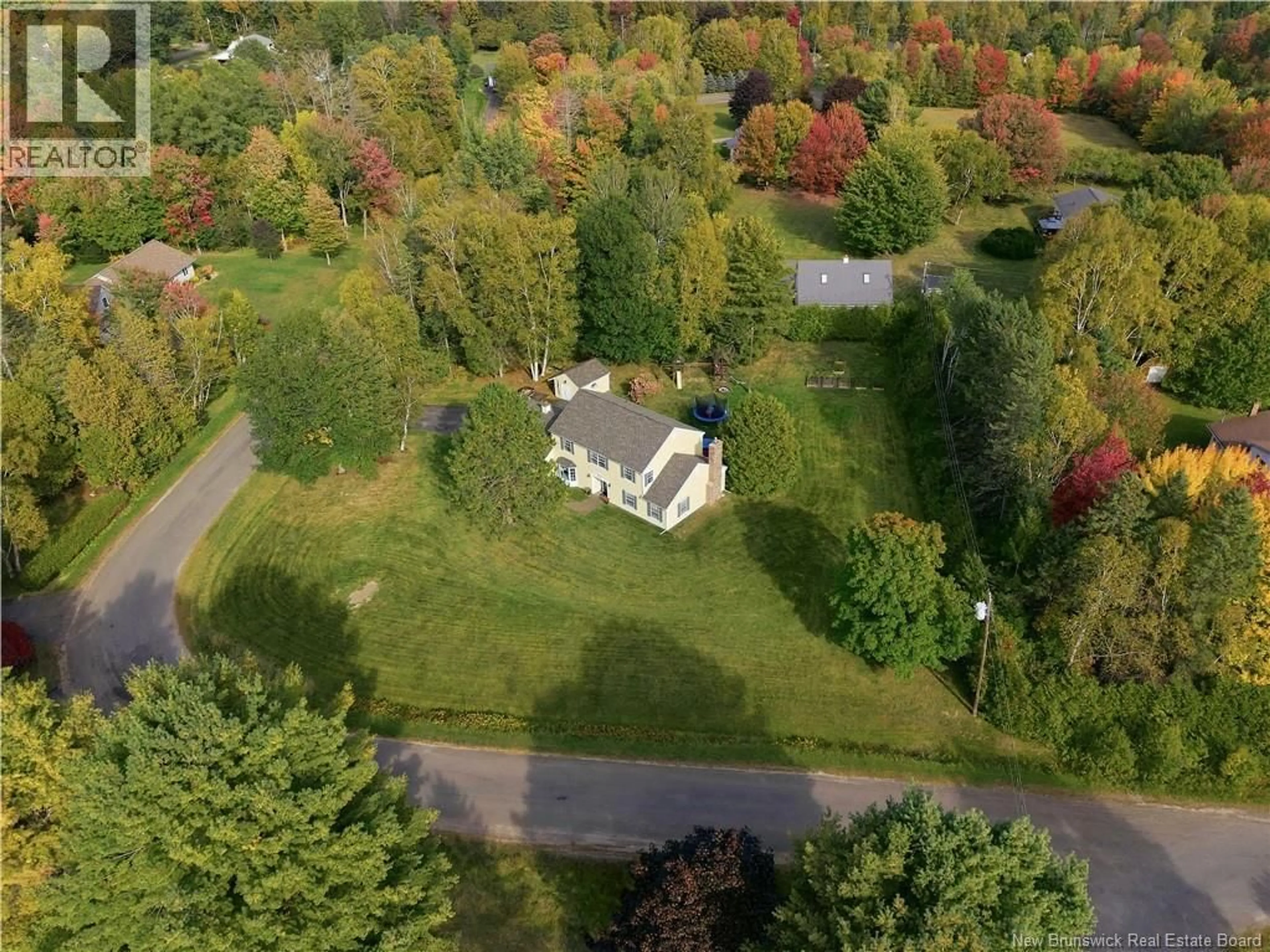 A pic from outside/outdoor area/front of a property/back of a property/a pic from drone, forest/trees view for 11 IDLEWOOD DRIVE, Island View New Brunswick E3E1A2
