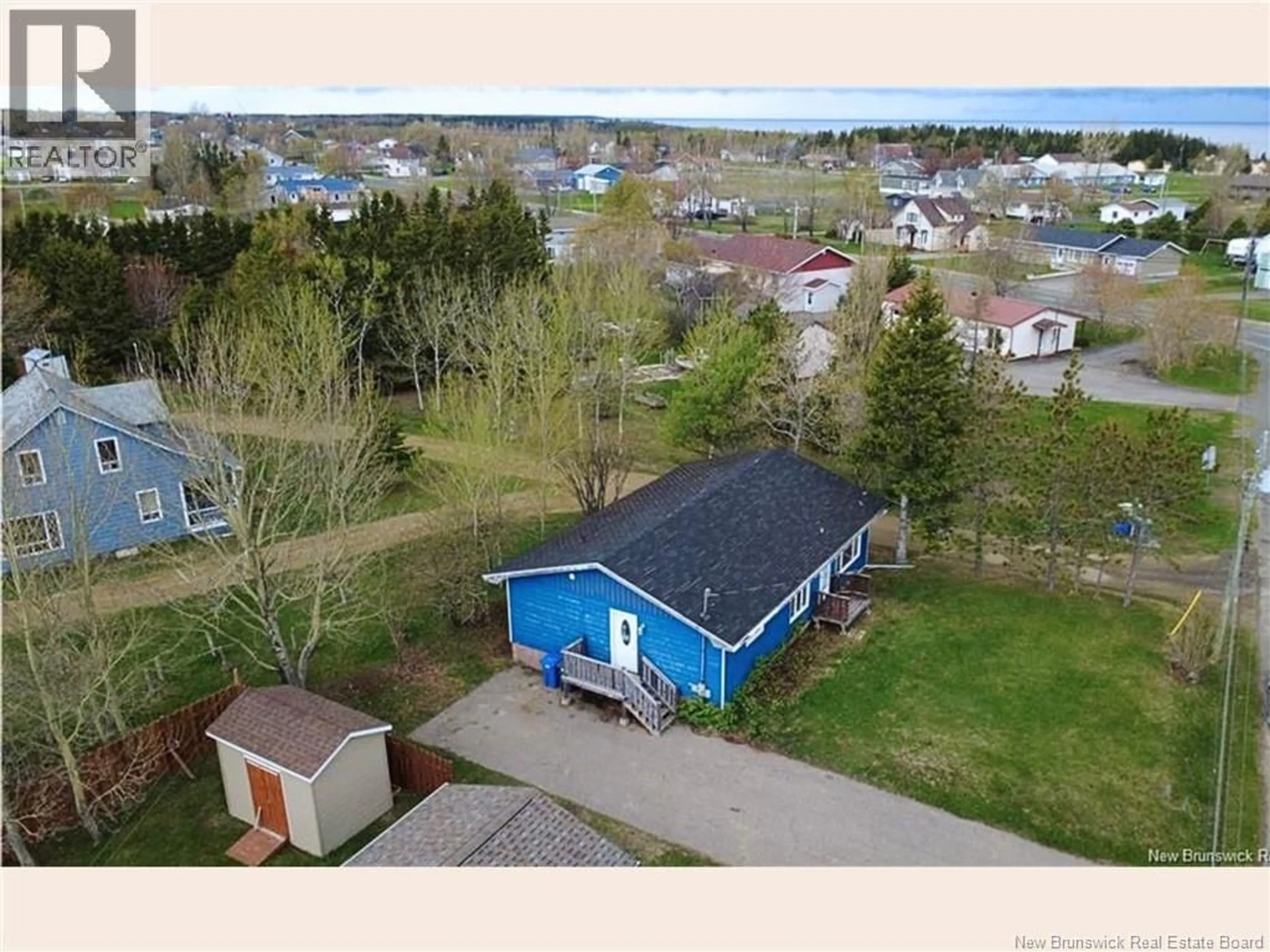A pic from outside/outdoor area/front of a property/back of a property/a pic from drone, water/lake/river/ocean view for 2938 RUE CHIASSON, Bas-Caraquet New Brunswick E1W5V7
