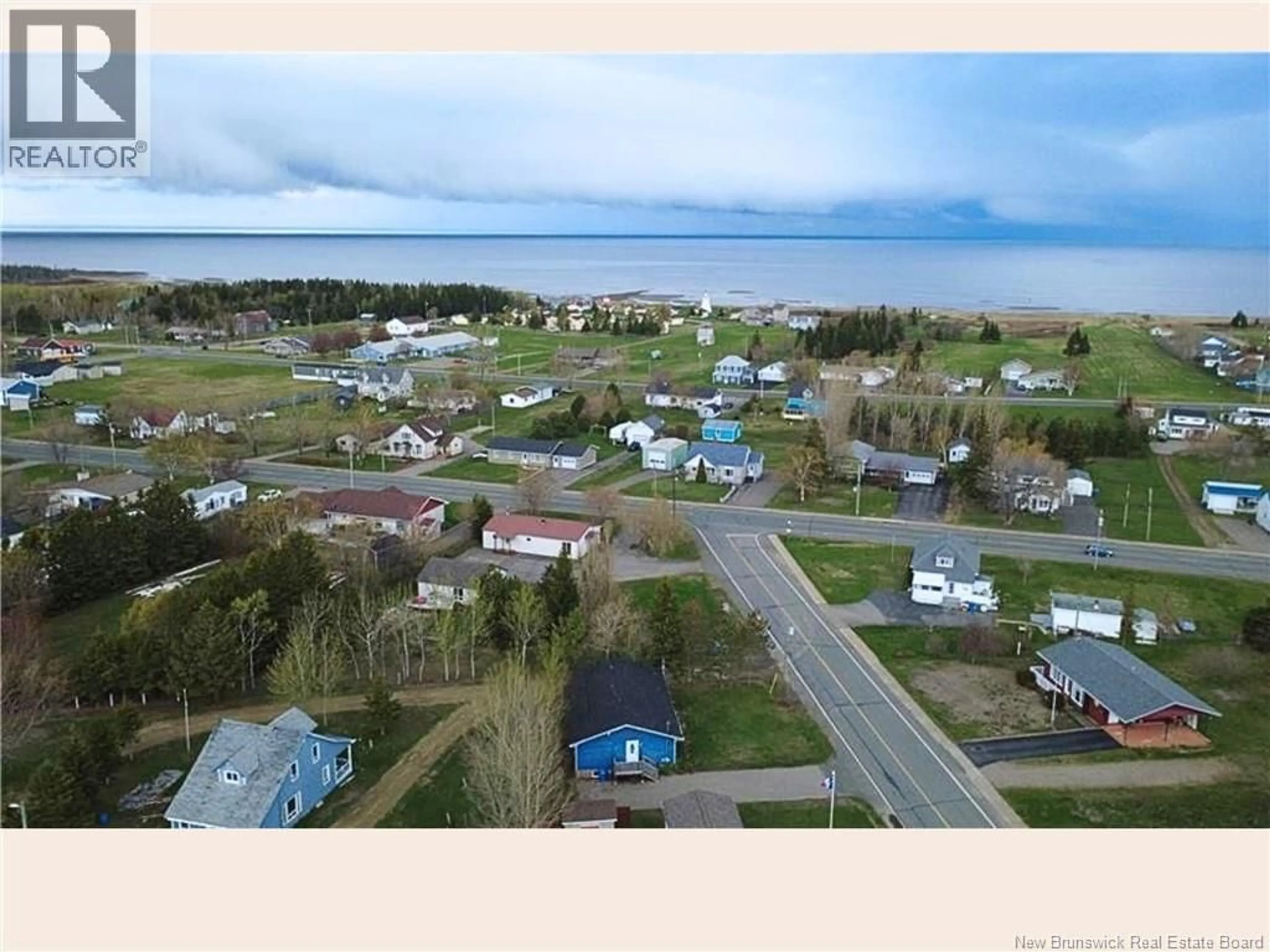 A pic from outside/outdoor area/front of a property/back of a property/a pic from drone, water/lake/river/ocean view for 2938 RUE CHIASSON, Bas-Caraquet New Brunswick E1W5V7