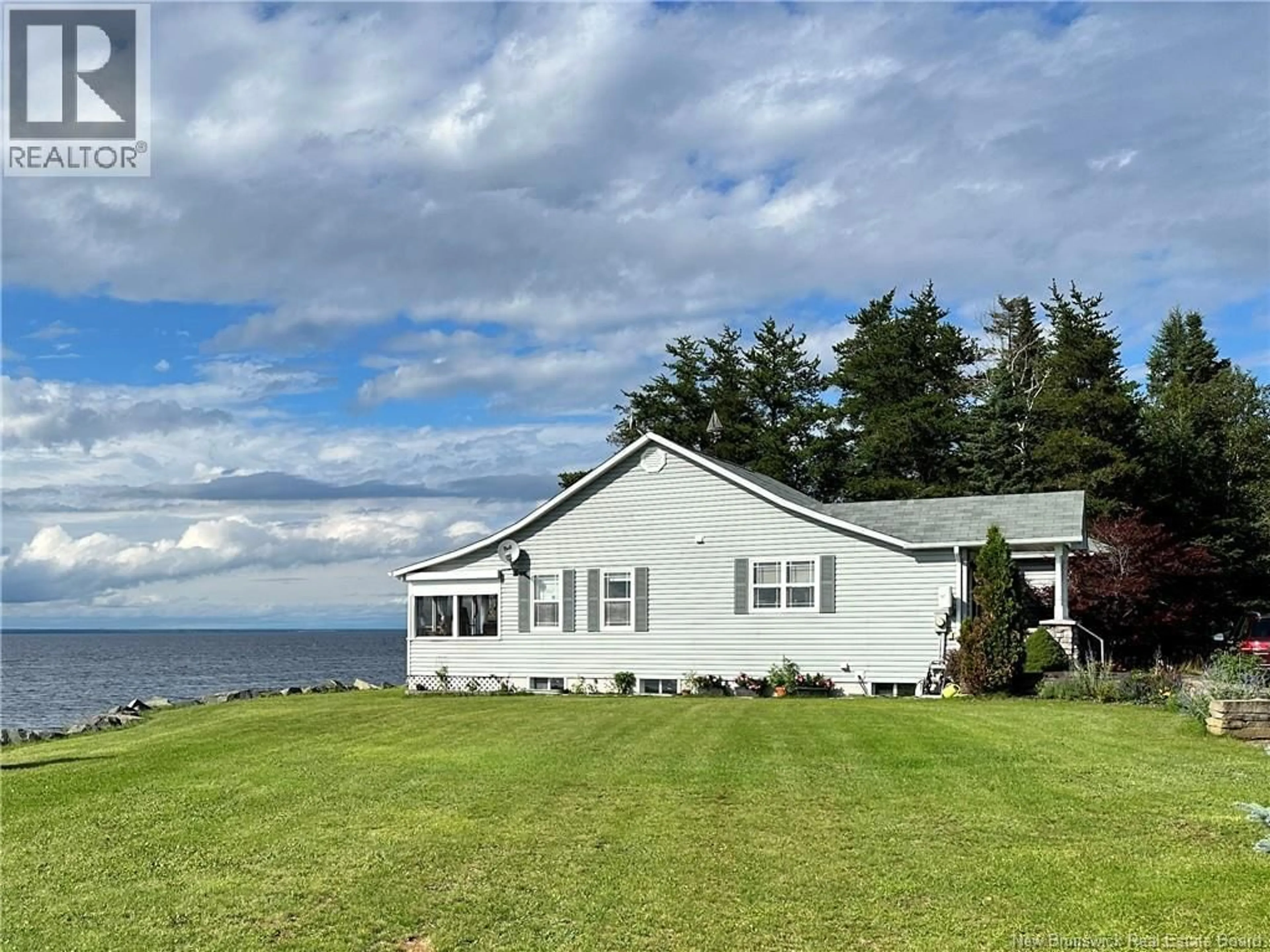 A pic from outside/outdoor area/front of a property/back of a property/a pic from drone, water/lake/river/ocean view for 38 FRONT ROAD, Bay Du Vin New Brunswick E1N5K1