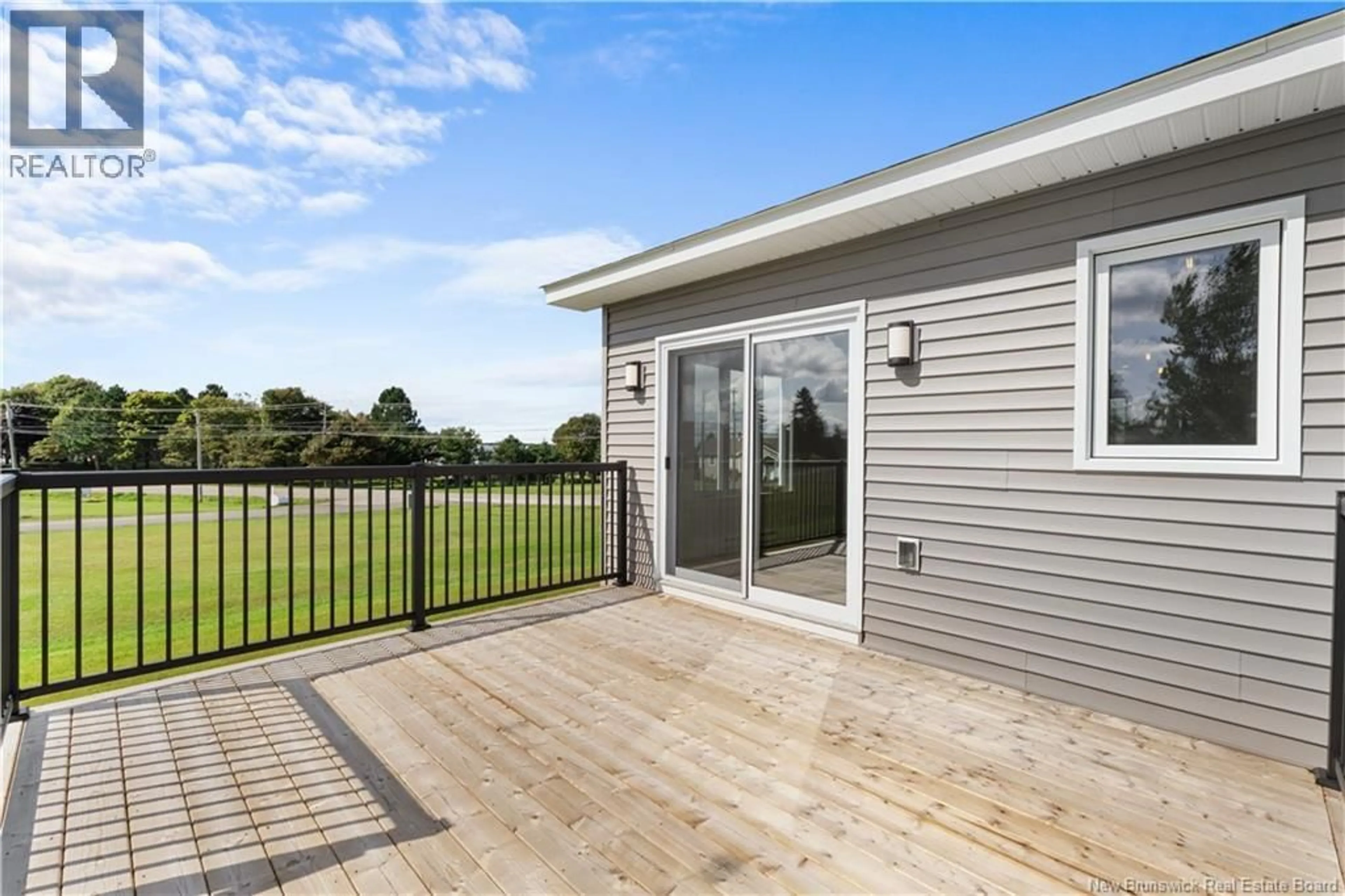 A pic from outside/outdoor area/front of a property/back of a property/a pic from drone, water/lake/river/ocean view for 979 RTE 133, Grand-Barachois New Brunswick E4P8C2