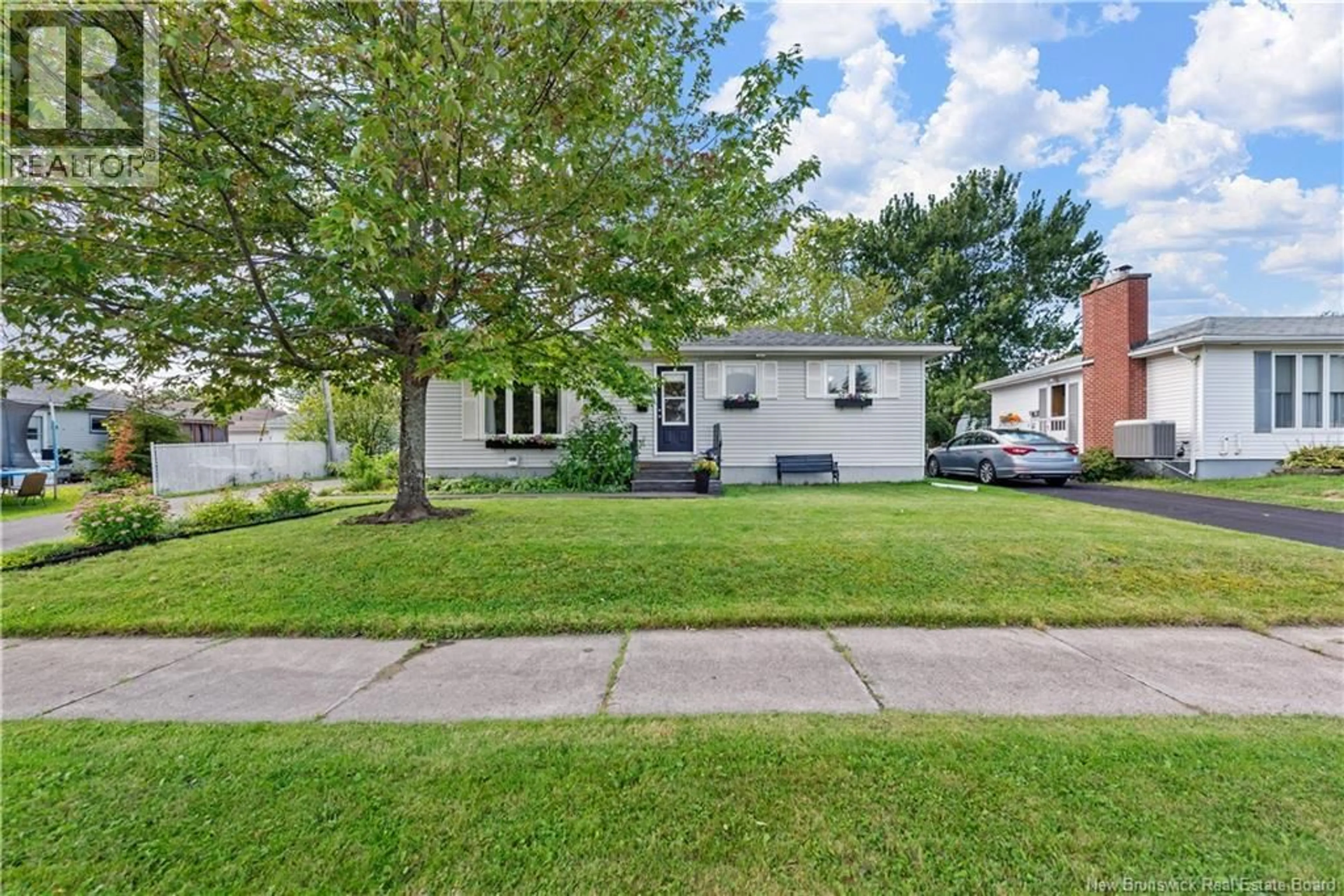 Home with vinyl exterior material, street for 20 DOLPHIN DRIVE, Moncton New Brunswick E1A4W4