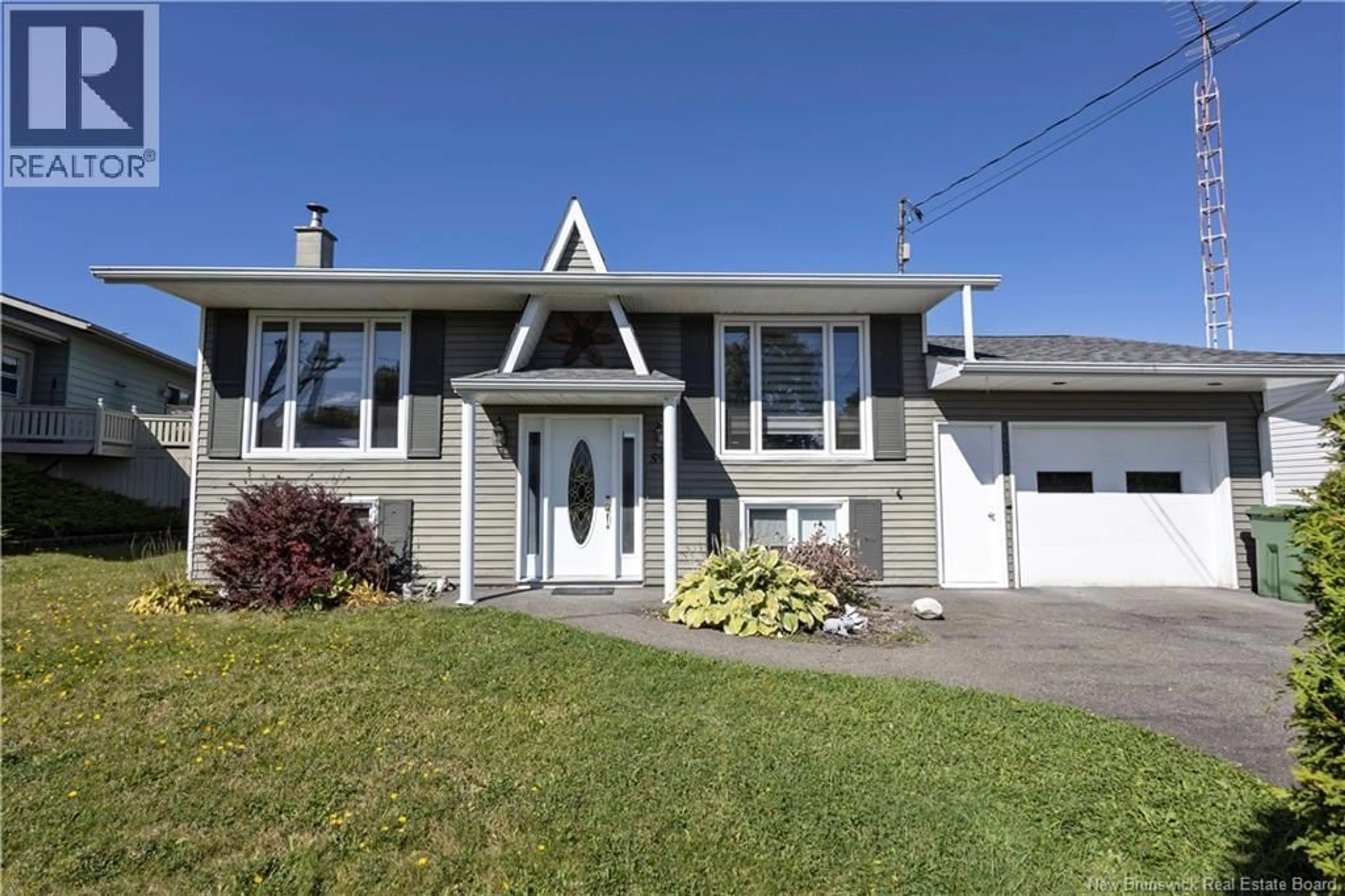 Home with vinyl exterior material, street for 592 FIRST AVENUE, Grand-Sault/Grand Falls New Brunswick E3Z1B3