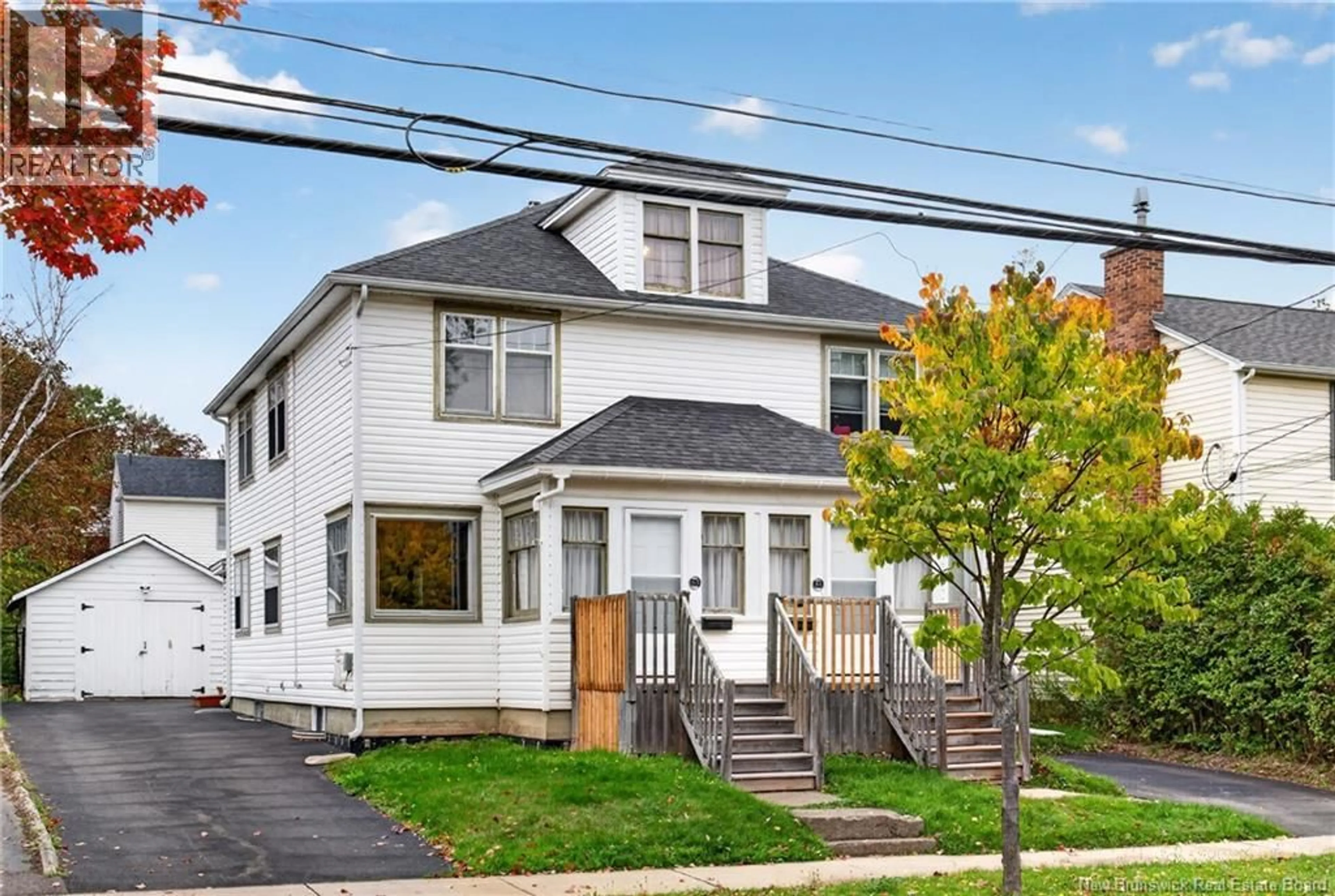 Home with vinyl exterior material, street for 61-63 BURLINGTON AVENUE, Moncton New Brunswick E1E1Z2