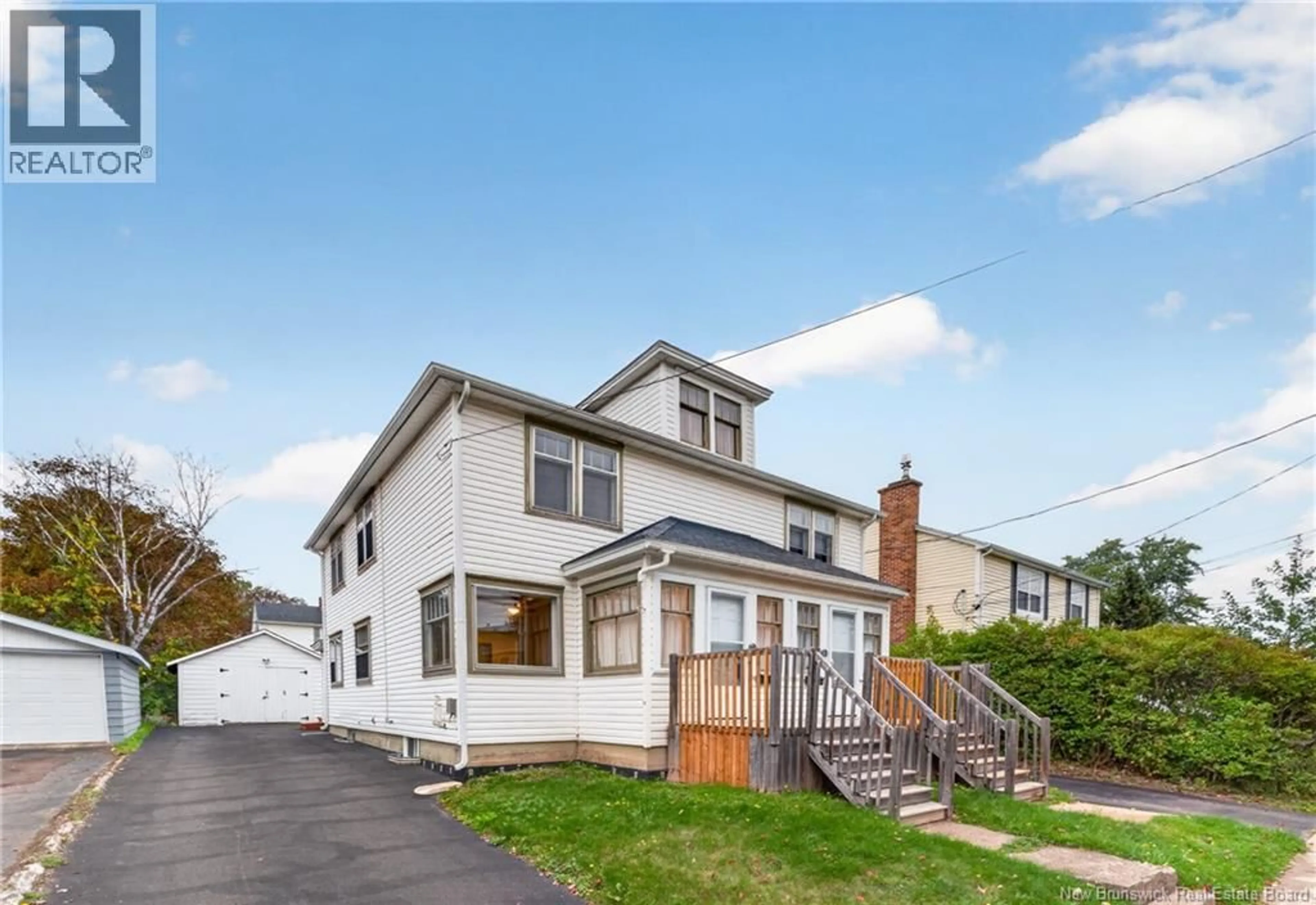 Home with vinyl exterior material, street for 61-63 BURLINGTON AVENUE, Moncton New Brunswick E1E1Z2