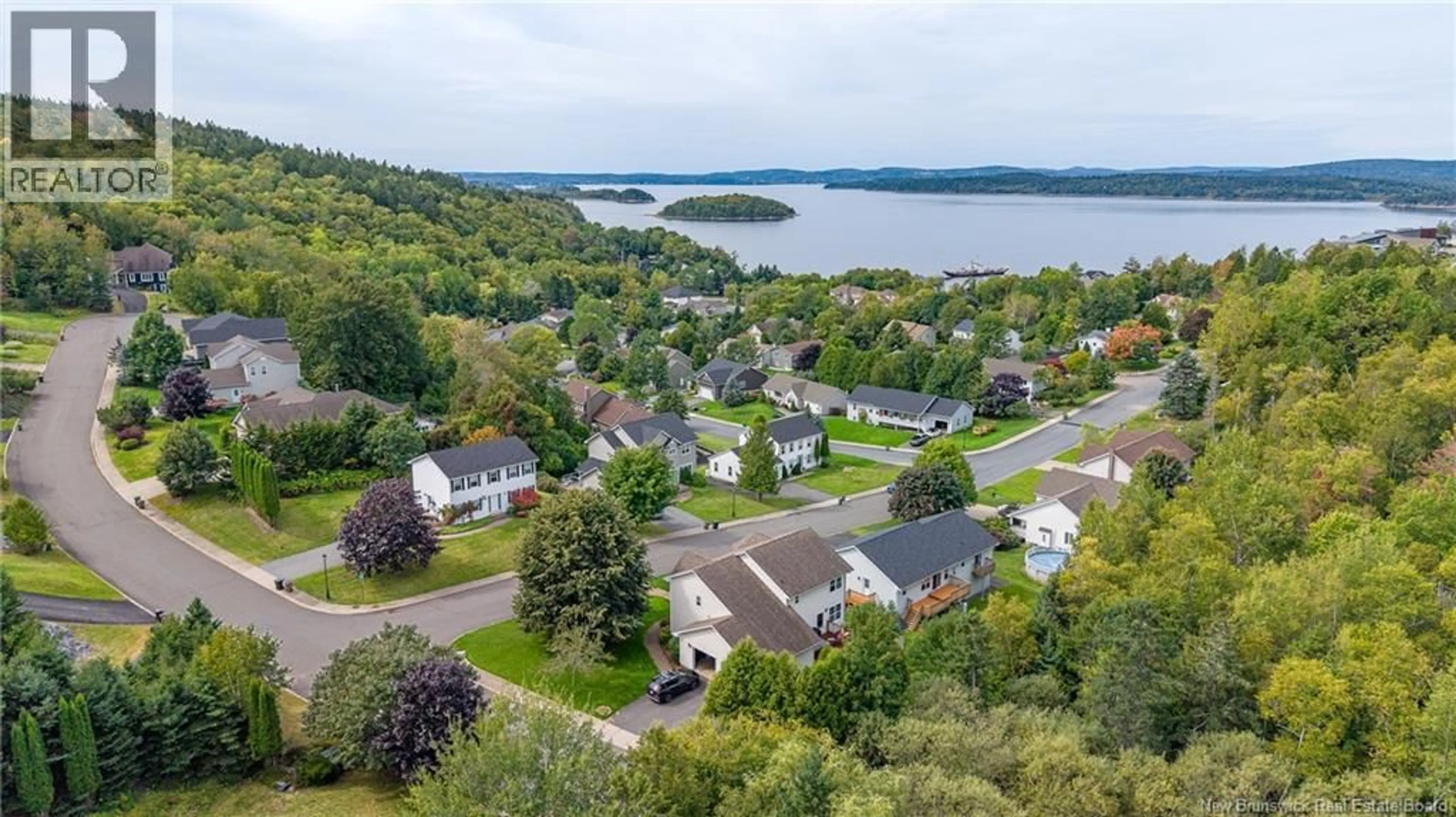 A pic from outside/outdoor area/front of a property/back of a property/a pic from drone, water/lake/river/ocean view for 23 LENTOOK AVENUE, Saint John New Brunswick E2K5G6