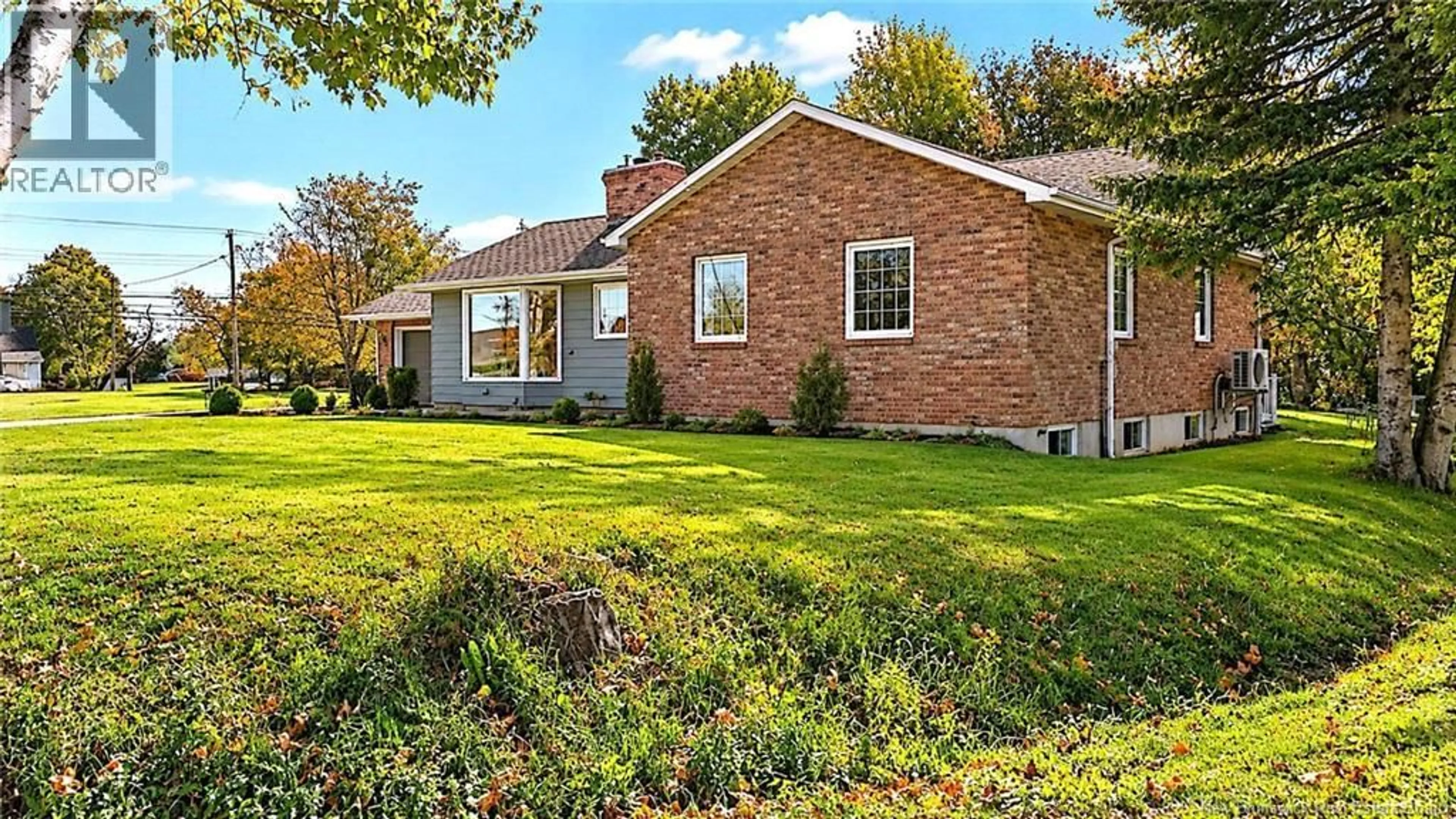 Home with brick exterior material, street for 496 BREAU RUE, Tracadie New Brunswick E1X1E3