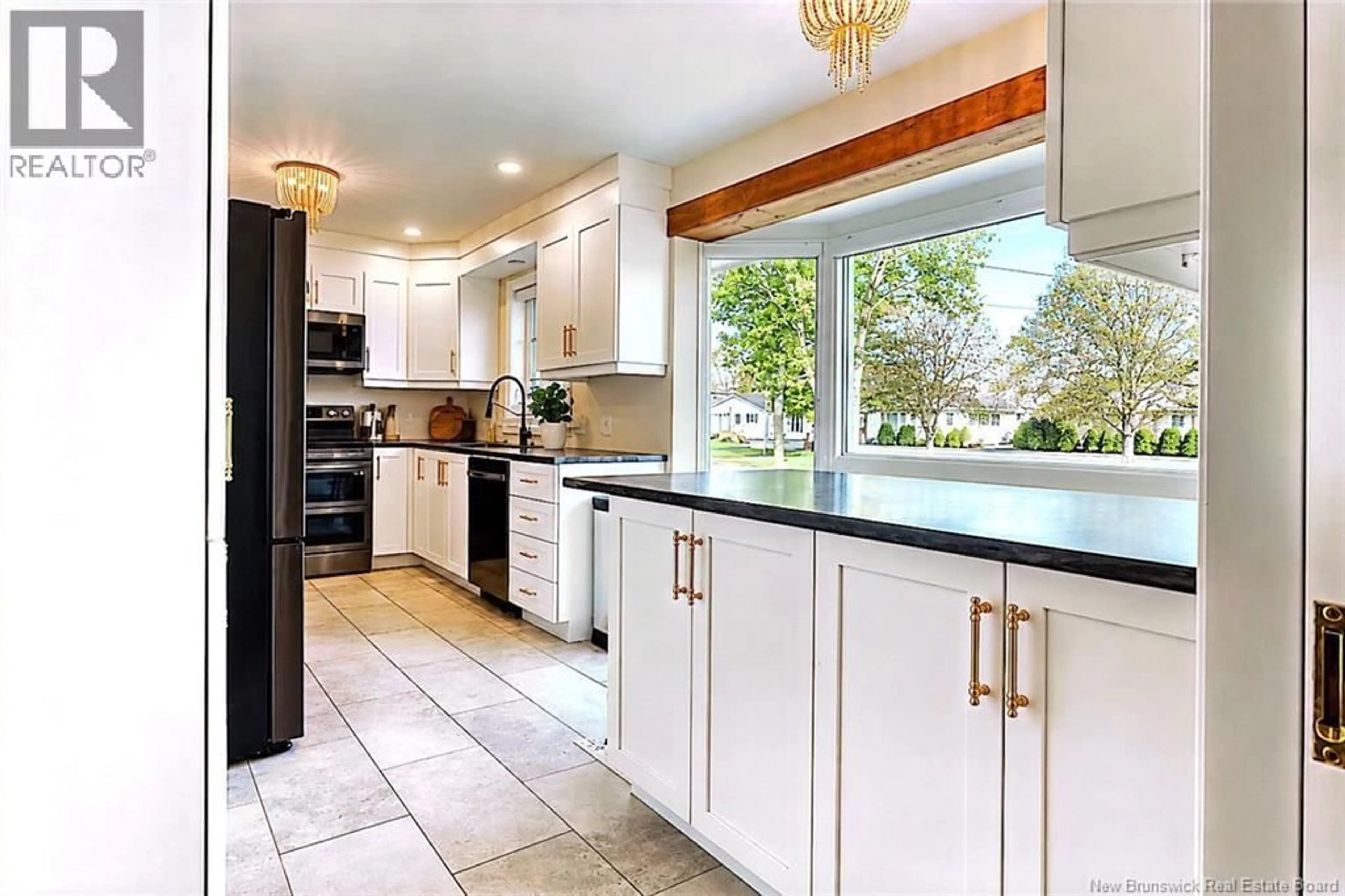 Open concept kitchen, ceramic/tile floor for 496 BREAU RUE, Tracadie New Brunswick E1X1E3