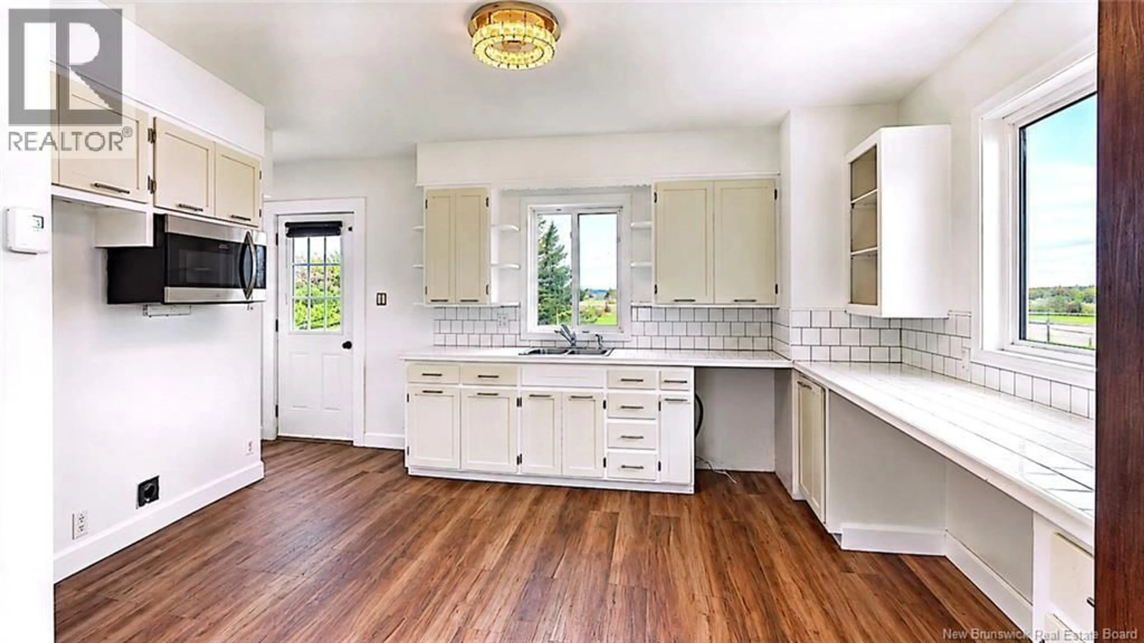 Open concept kitchen, unknown for 275 RUE ACADIE, Grande-Anse New Brunswick E8N1B9