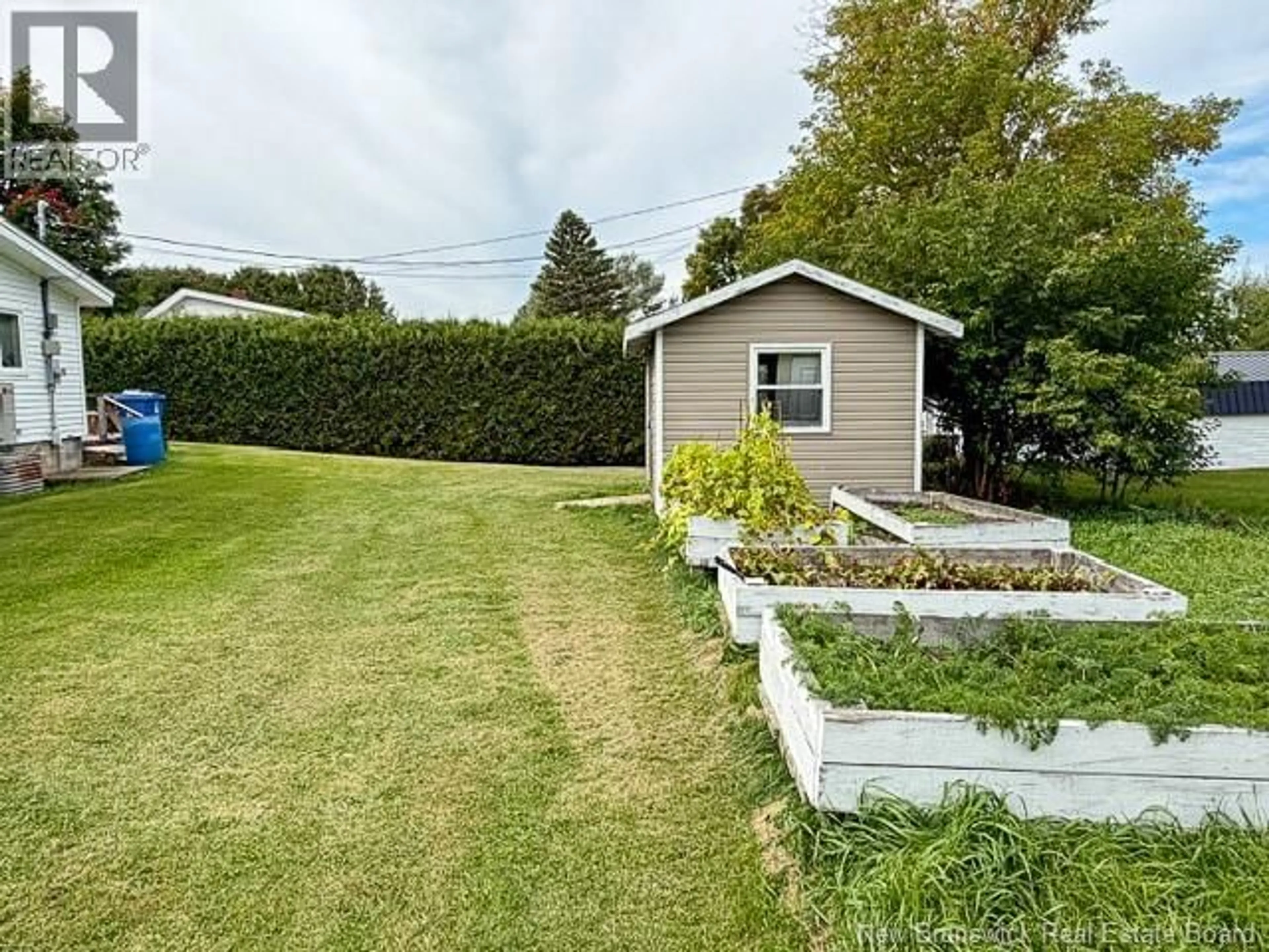 A pic from outside/outdoor area/front of a property/back of a property/a pic from drone, water/lake/river/ocean view for 93 HILLCREST AVENUE, Hartland New Brunswick E7P1H9