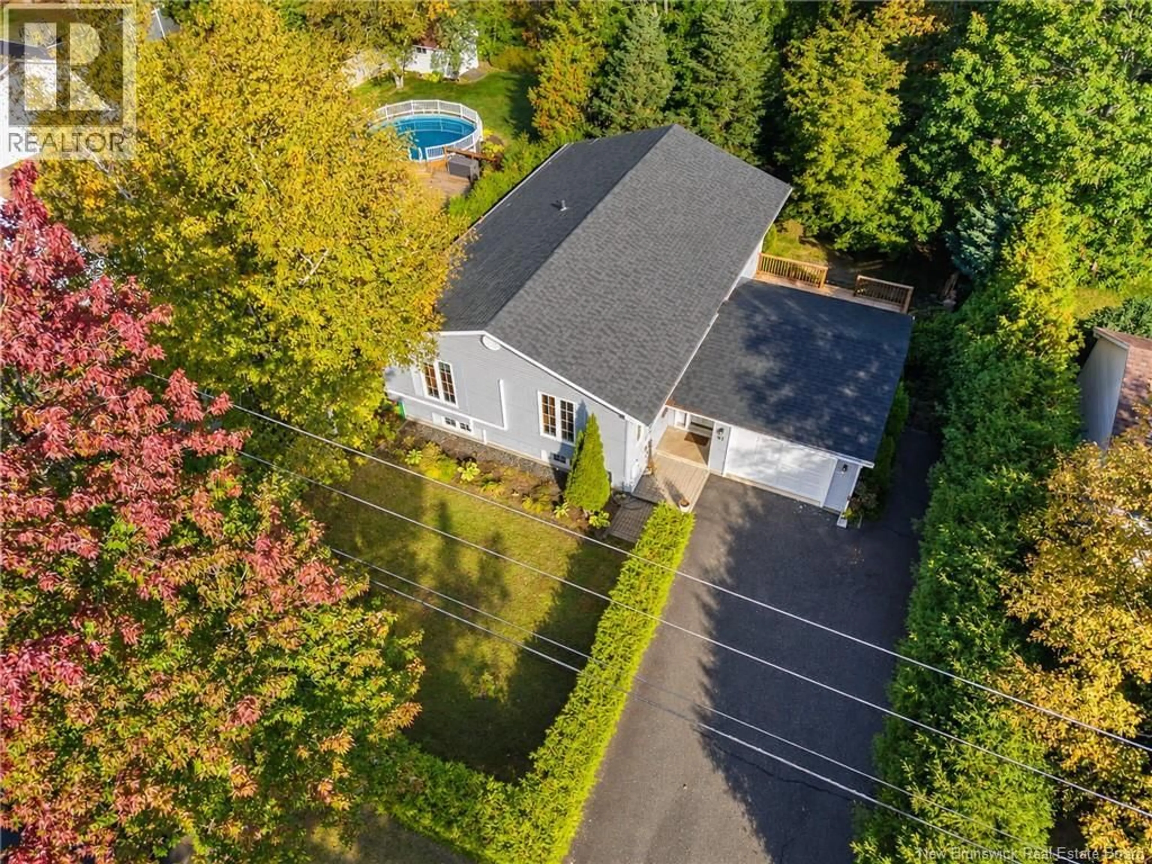 A pic from outside/outdoor area/front of a property/back of a property/a pic from drone, street for 91 BAILEY AVENUE, Fredericton New Brunswick E3A5V1