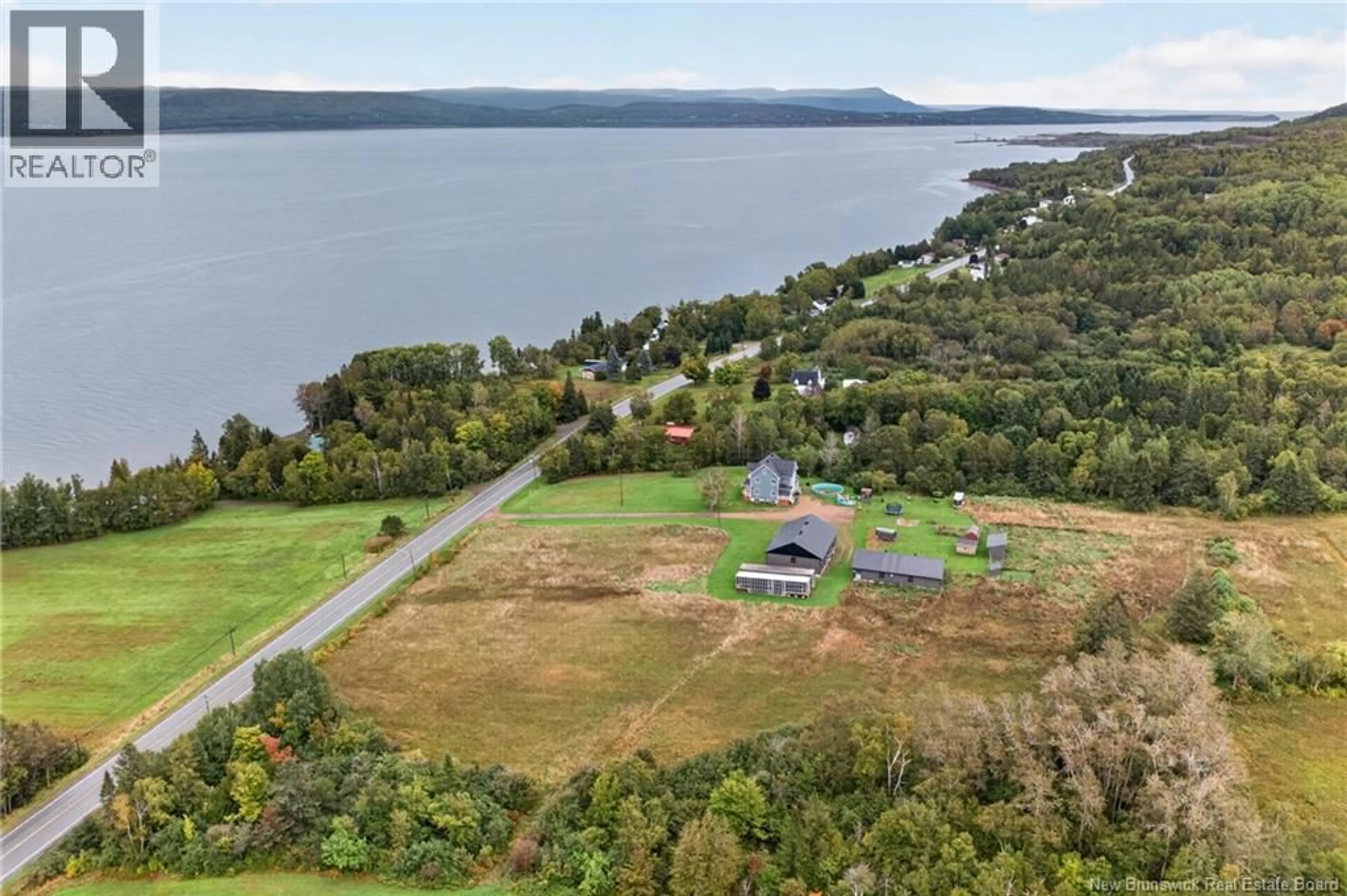 A pic from outside/outdoor area/front of a property/back of a property/a pic from drone, water/lake/river/ocean view for 29205 134 ROUTE, Point La Nim New Brunswick E3N6C7
