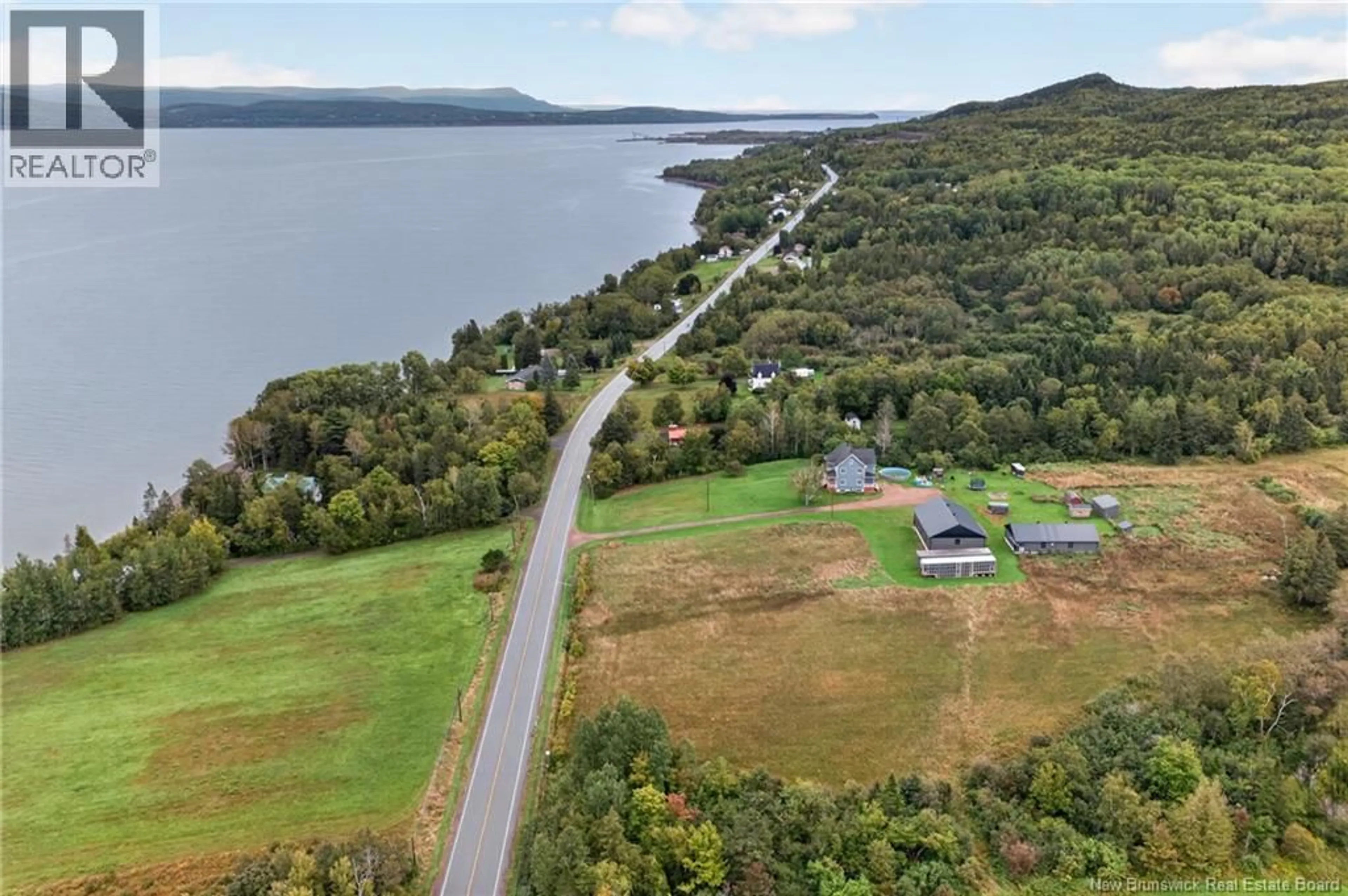 A pic from outside/outdoor area/front of a property/back of a property/a pic from drone, water/lake/river/ocean view for 29205 134 ROUTE, Point La Nim New Brunswick E3N6C7