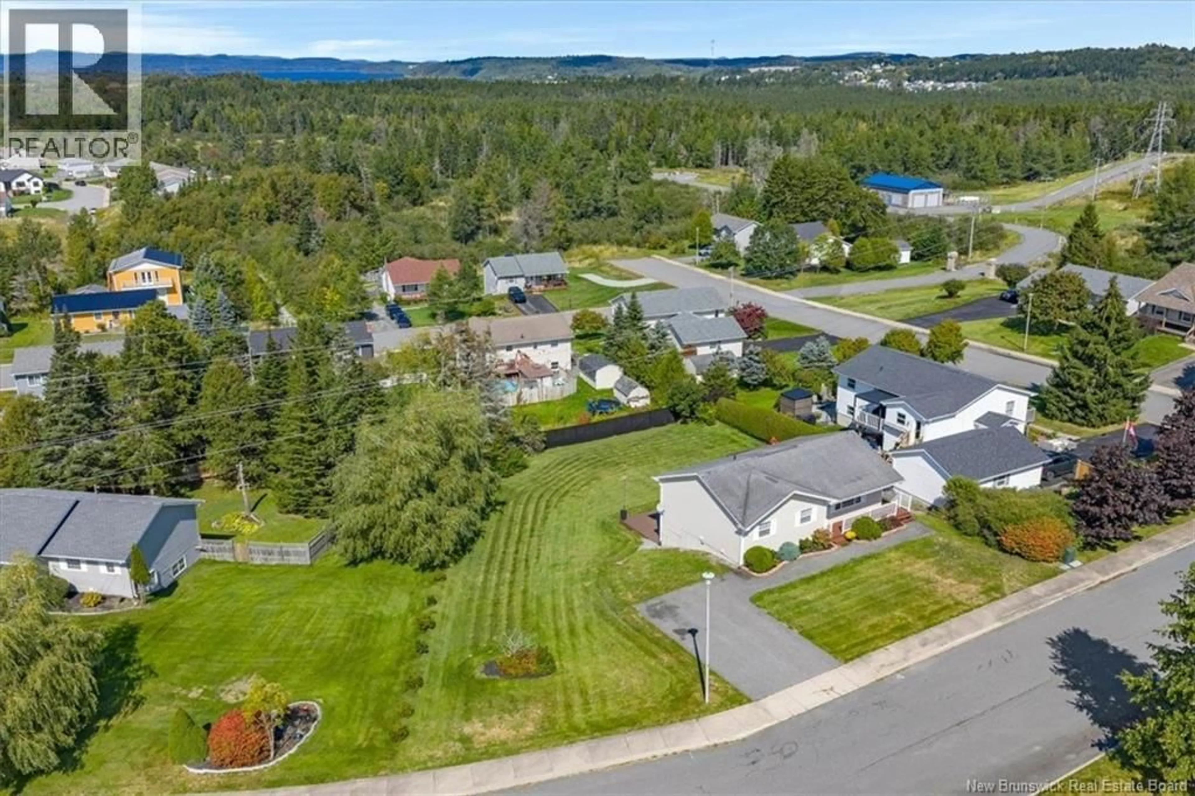 A pic from outside/outdoor area/front of a property/back of a property/a pic from drone, unknown for 8 ERIN COURT, Saint John New Brunswick E2M5S7