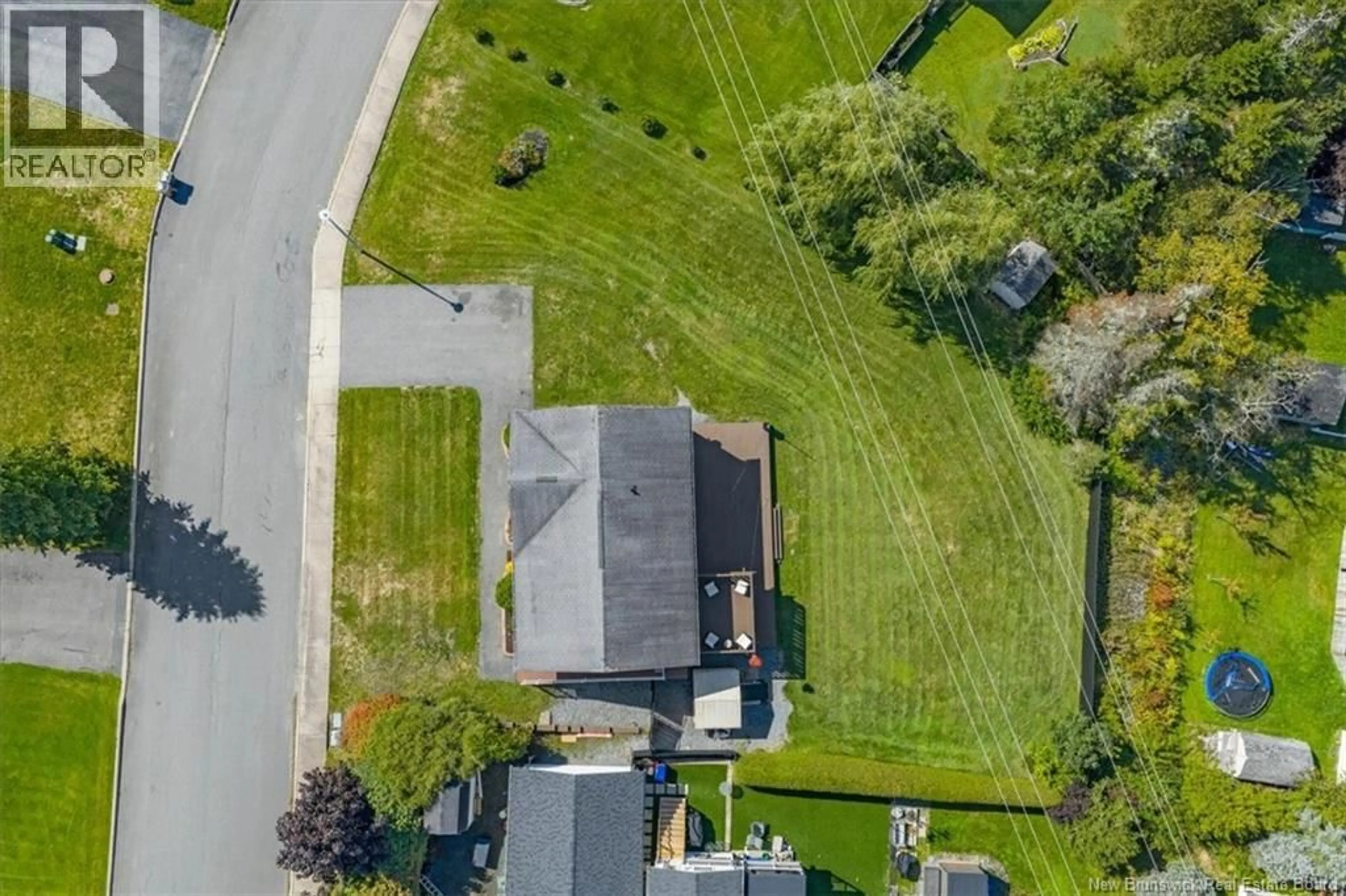 A pic from outside/outdoor area/front of a property/back of a property/a pic from drone, street for 8 ERIN COURT, Saint John New Brunswick E2M5S7