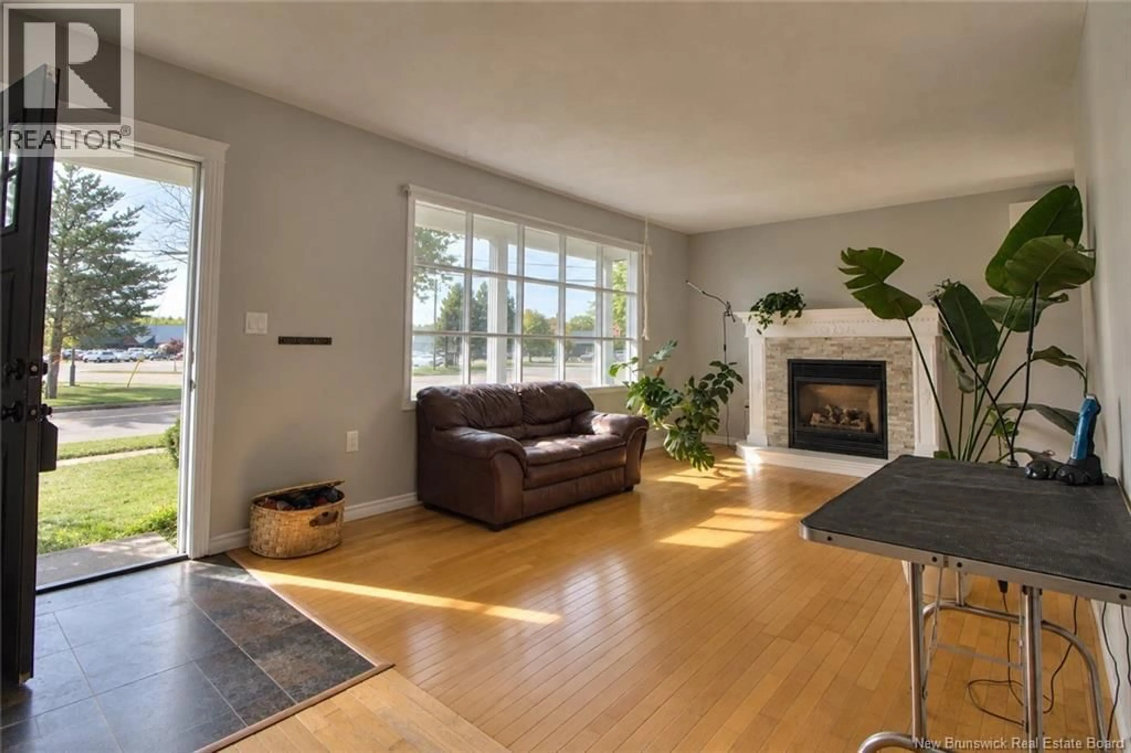 Living room with furniture, wood/laminate floor for 26 RANKINE, Richibucto New Brunswick E4W4G7