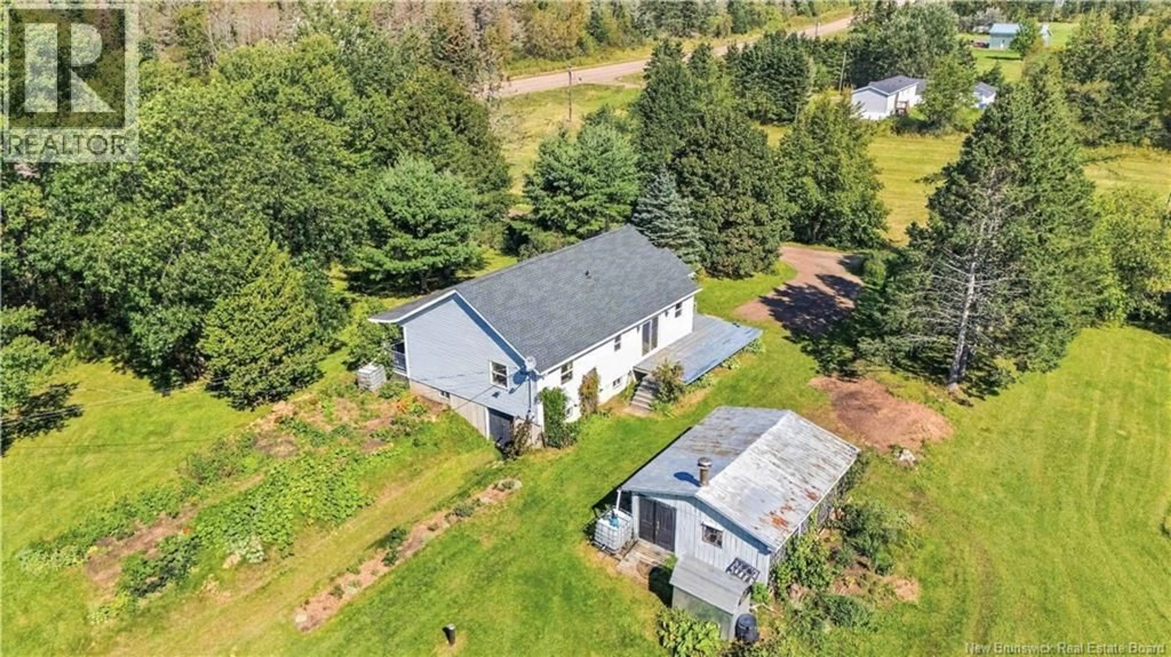 A pic from outside/outdoor area/front of a property/back of a property/a pic from drone, unknown for 509 ROUTE 16, Pointe de Bute New Brunswick E4L2N2