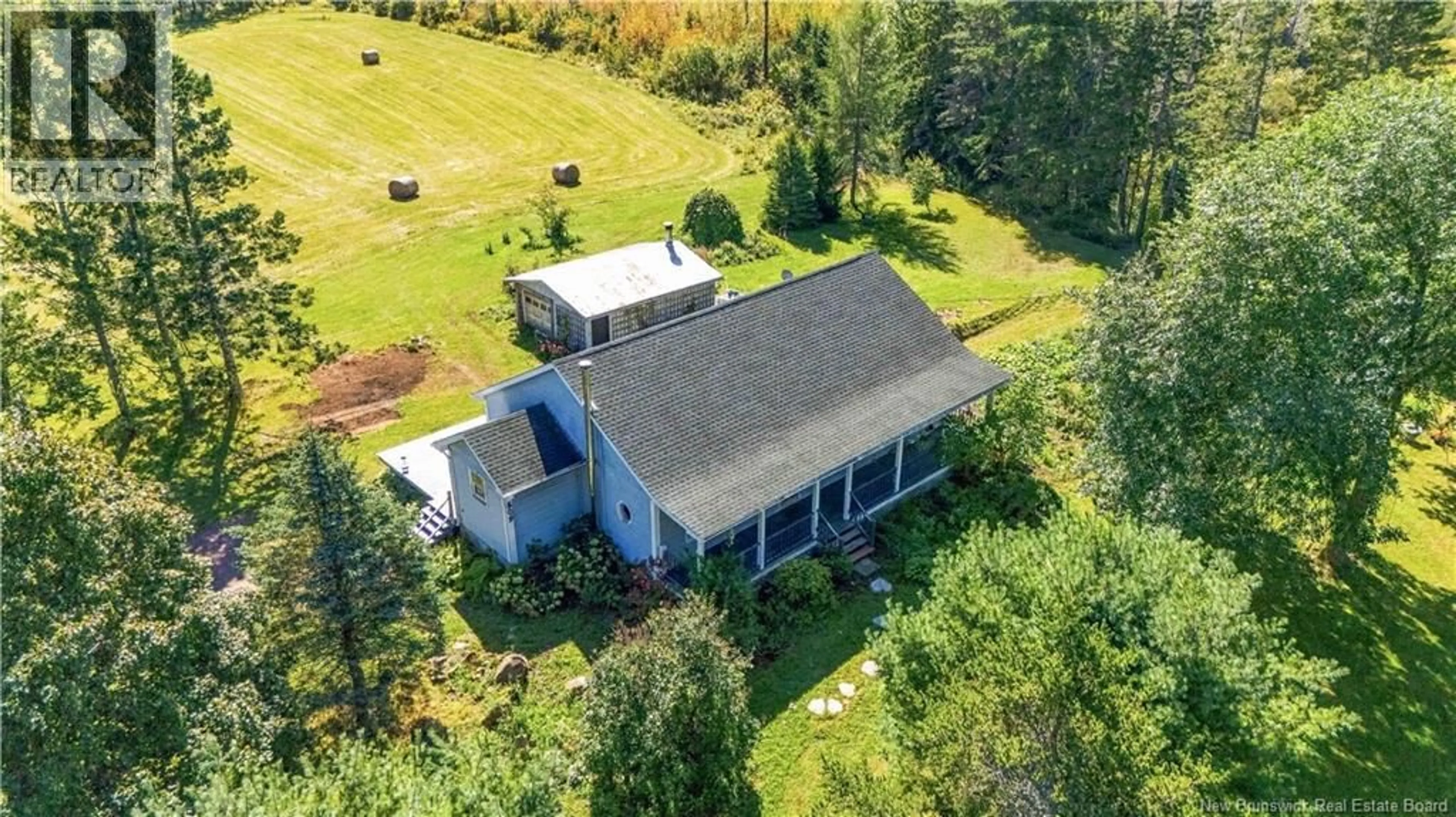 A pic from outside/outdoor area/front of a property/back of a property/a pic from drone, building for 509 ROUTE 16, Pointe de Bute New Brunswick E4L2N2