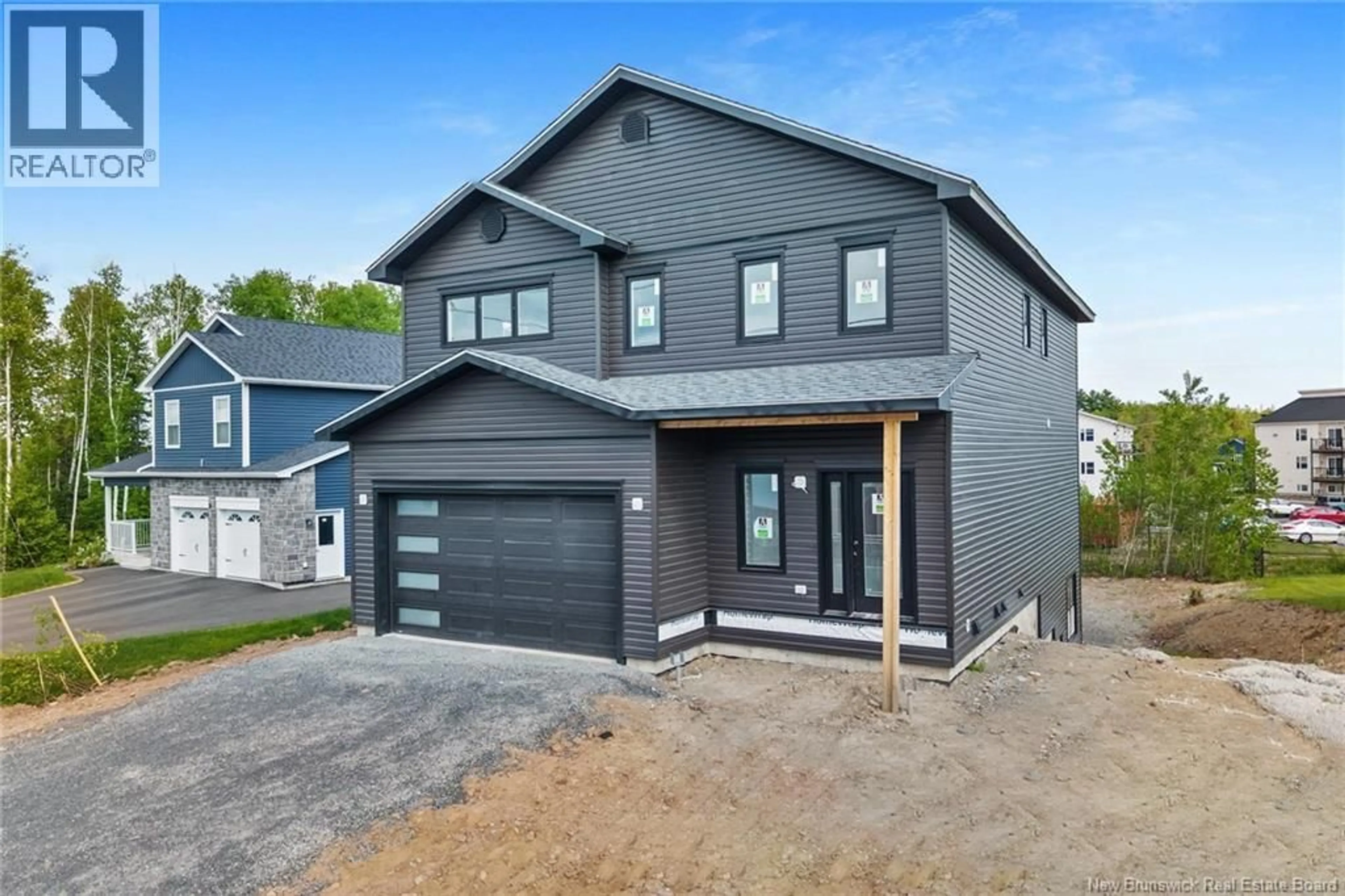 Home with brick exterior material, street for 39 WINTERBERRY DRIVE, Fredericton New Brunswick E3C0M3