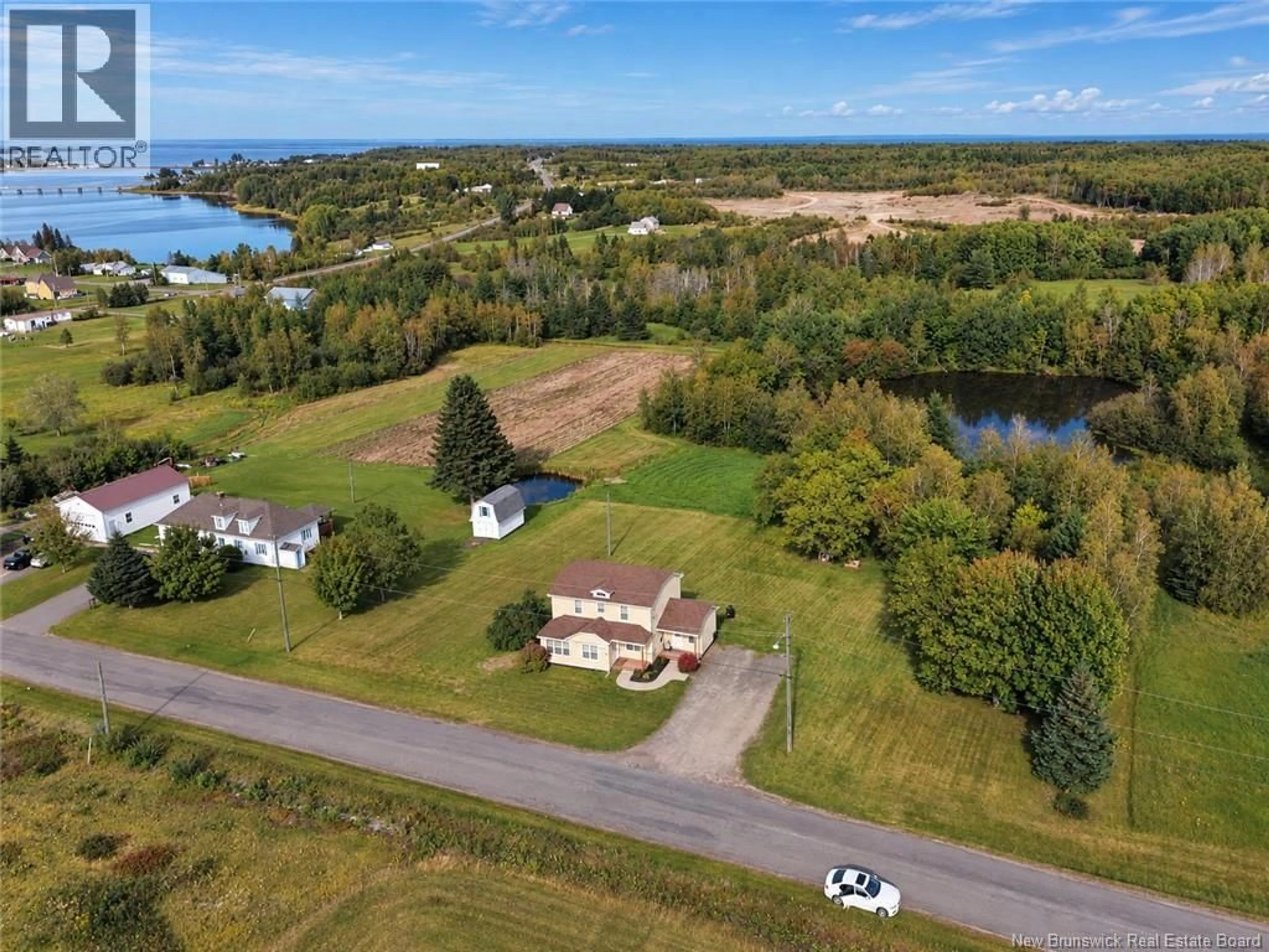 A pic from outside/outdoor area/front of a property/back of a property/a pic from drone, water/lake/river/ocean view for 65 ST-GREGOIRE, McKees Mills New Brunswick E4V2R2