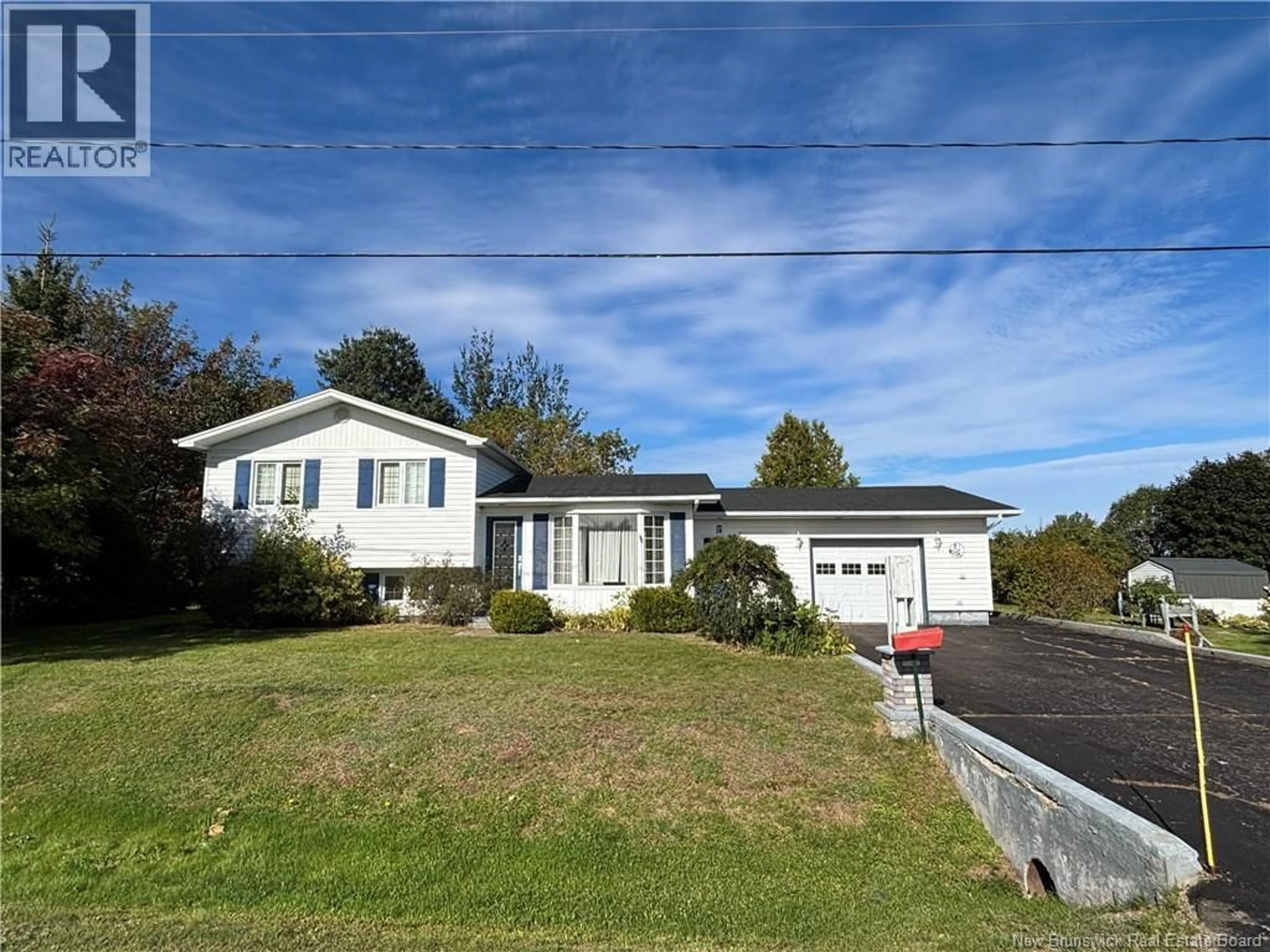 Home with vinyl exterior material, street for 28 CARR ST, Belledune New Brunswick E8G1Y6