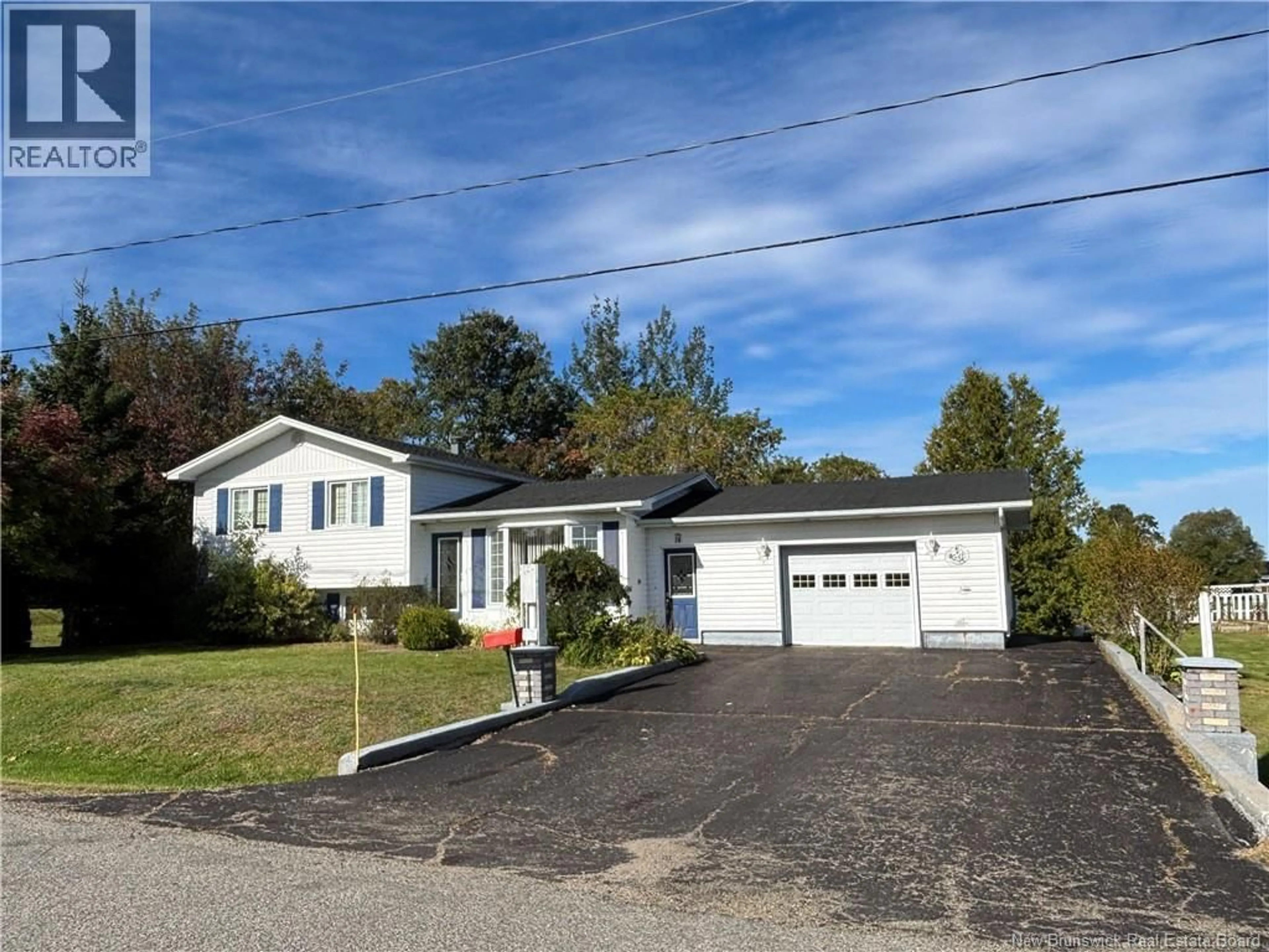 Home with vinyl exterior material, street for 28 CARR ST, Belledune New Brunswick E8G1Y6