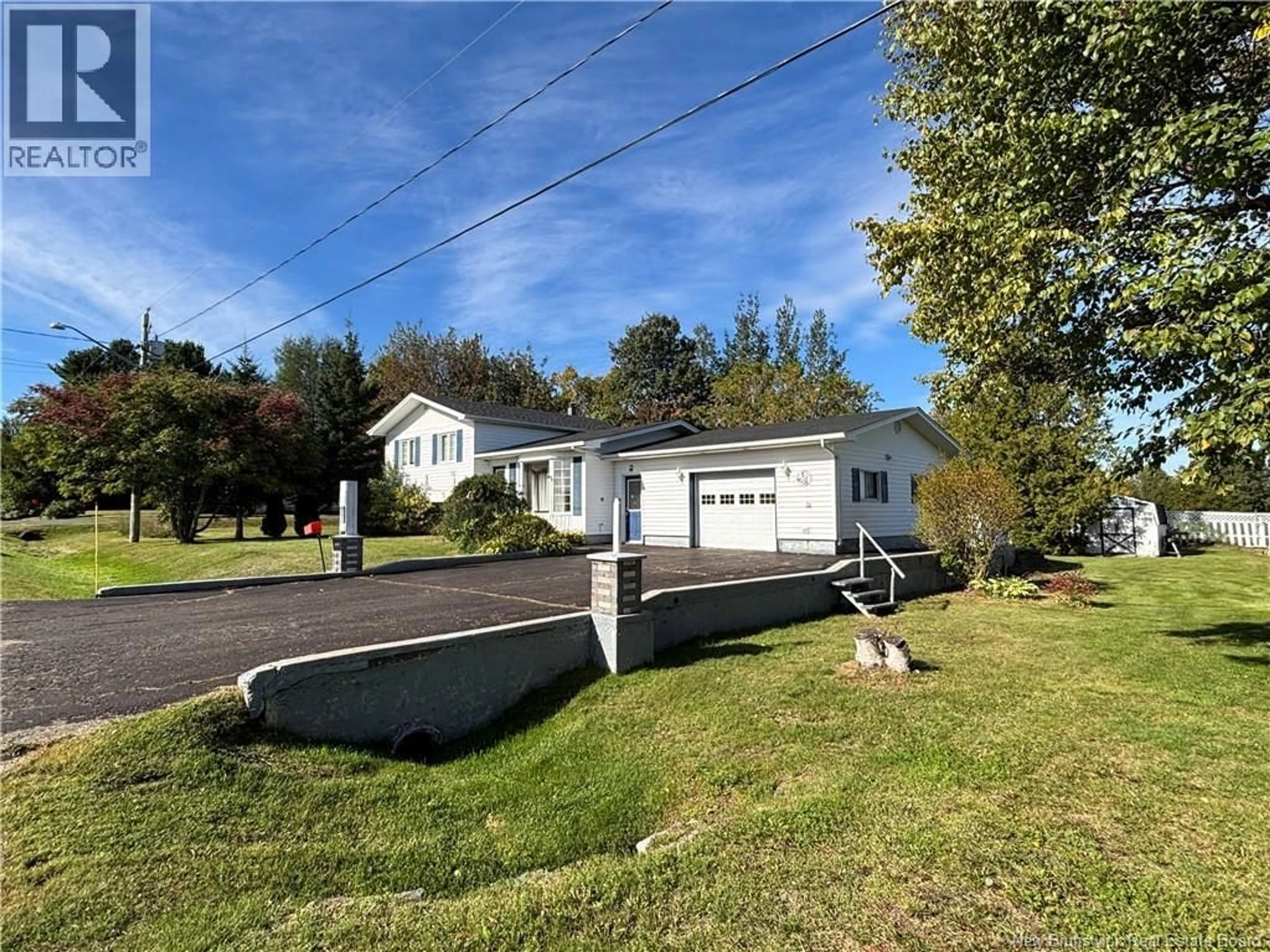 A pic from outside/outdoor area/front of a property/back of a property/a pic from drone, unknown for 28 CARR ST, Belledune New Brunswick E8G1Y6