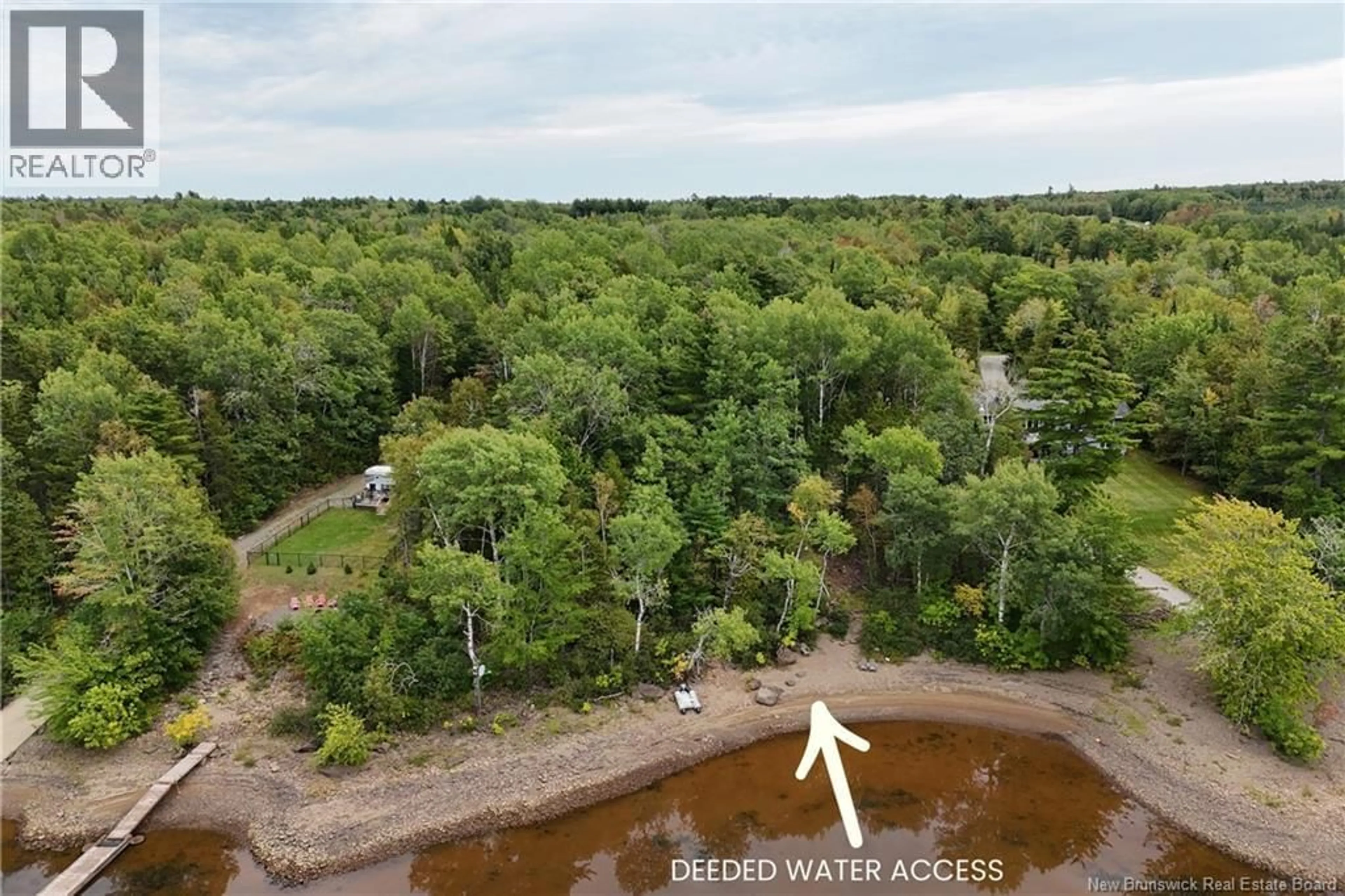 A pic from outside/outdoor area/front of a property/back of a property/a pic from drone, water/lake/river/ocean view for 6 BAY STREET, Cambridge-Narrows New Brunswick E4C0A8