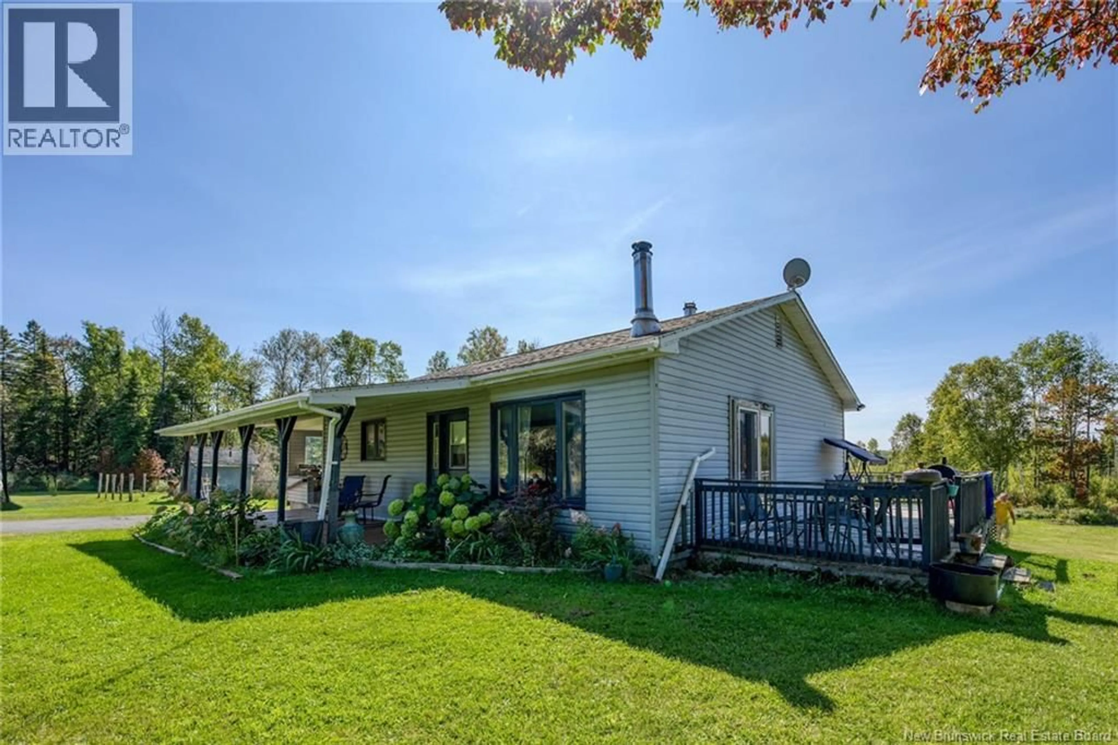 A pic from outside/outdoor area/front of a property/back of a property/a pic from drone, unknown for 211 ROUTE 395, Mclaughlin New Brunswick E7G3T7