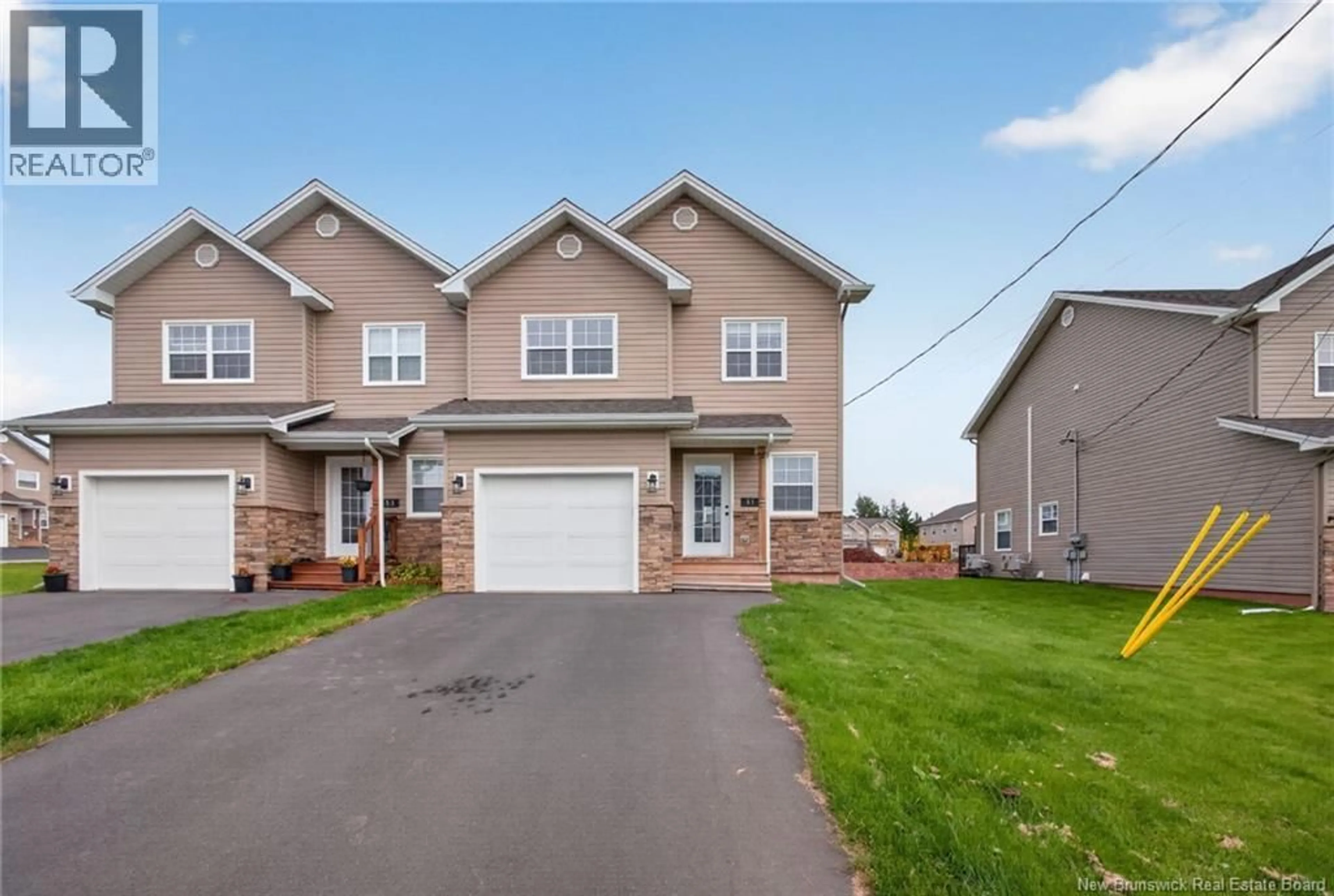 Home with vinyl exterior material, street for 51 LOUDUN STREET, Dieppe New Brunswick E1A9X5