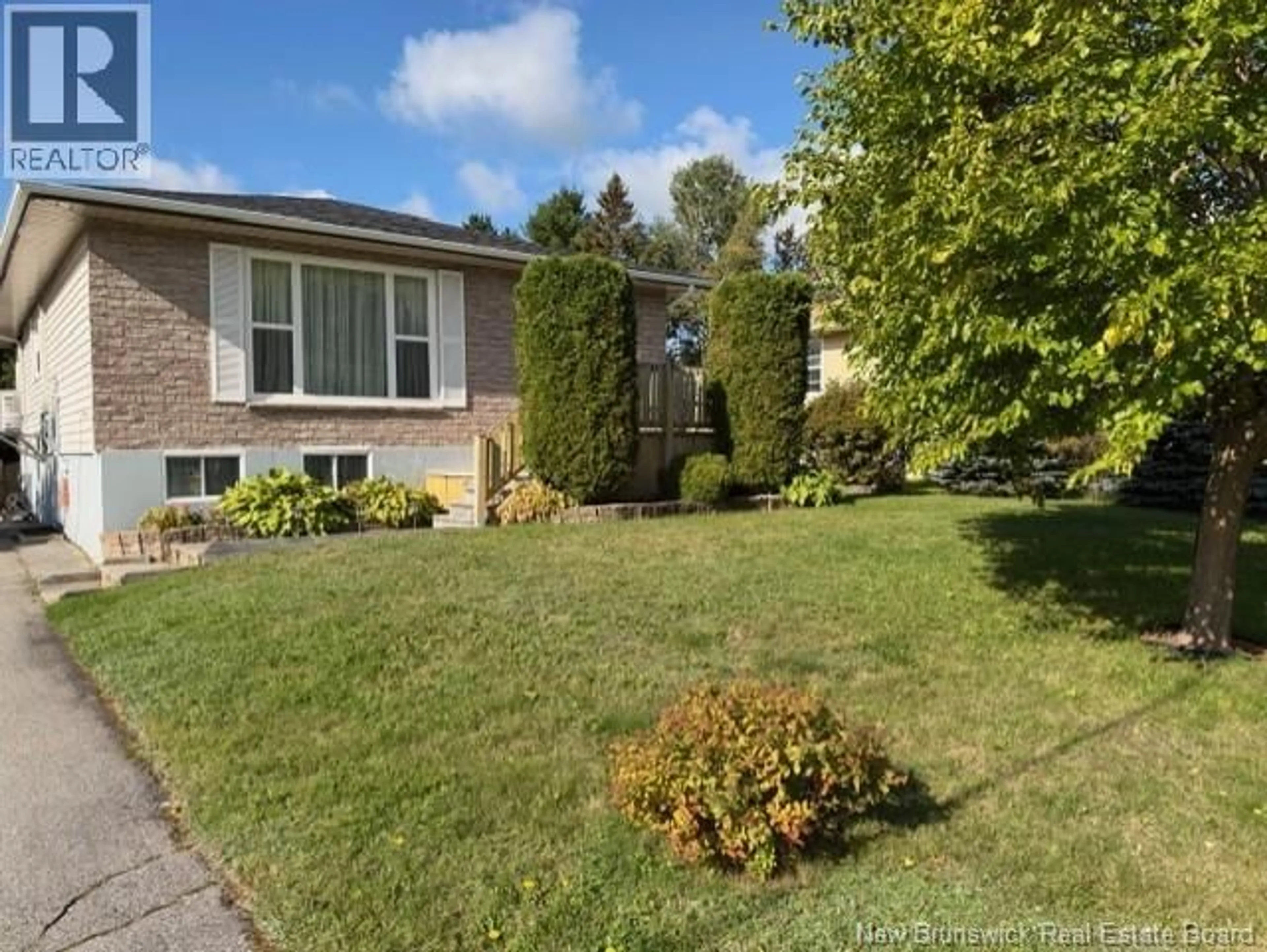 A pic from outside/outdoor area/front of a property/back of a property/a pic from drone, street for 231 HUTCHISON DRIVE, Miramichi New Brunswick E1V6C1