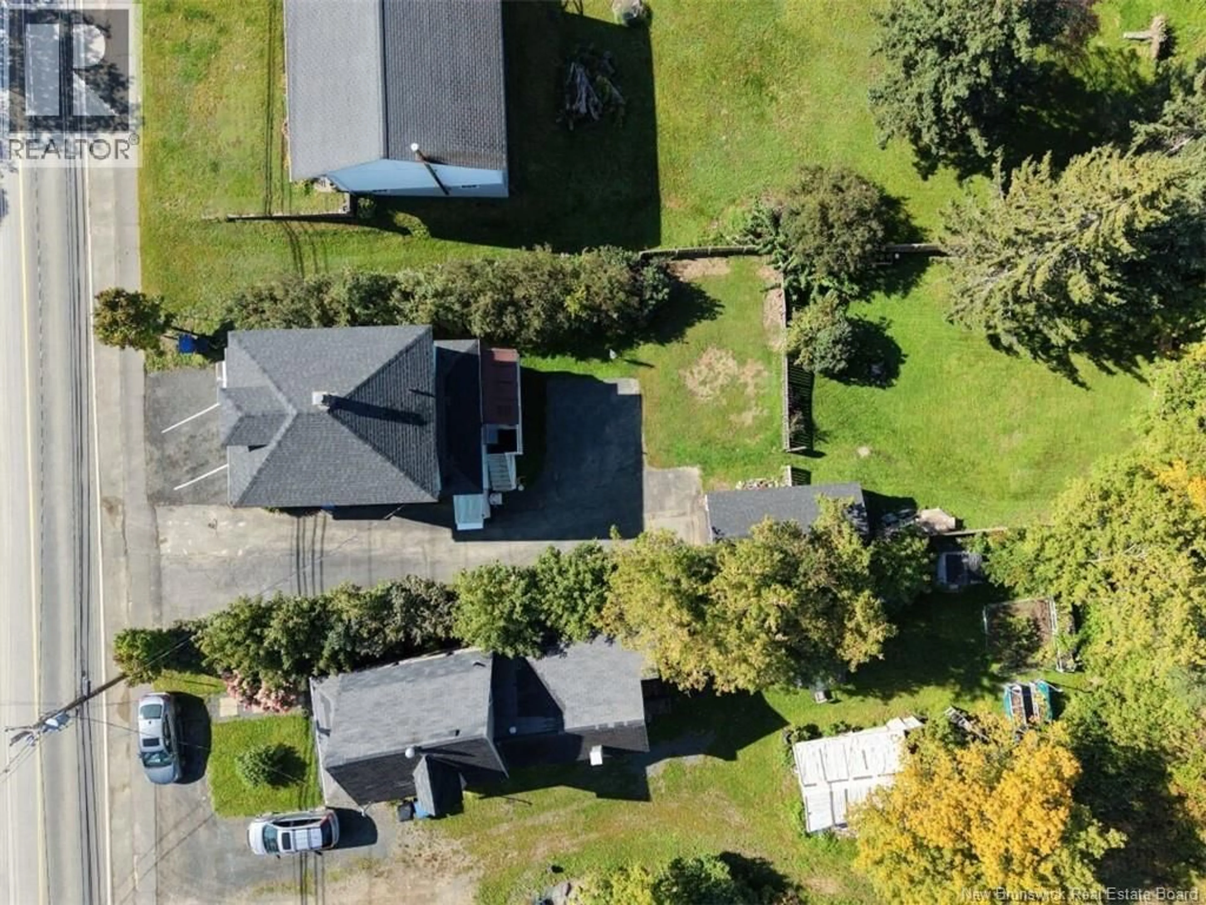 A pic from outside/outdoor area/front of a property/back of a property/a pic from drone, street for 745 BRIDGE, Bathurst New Brunswick E2A1W9