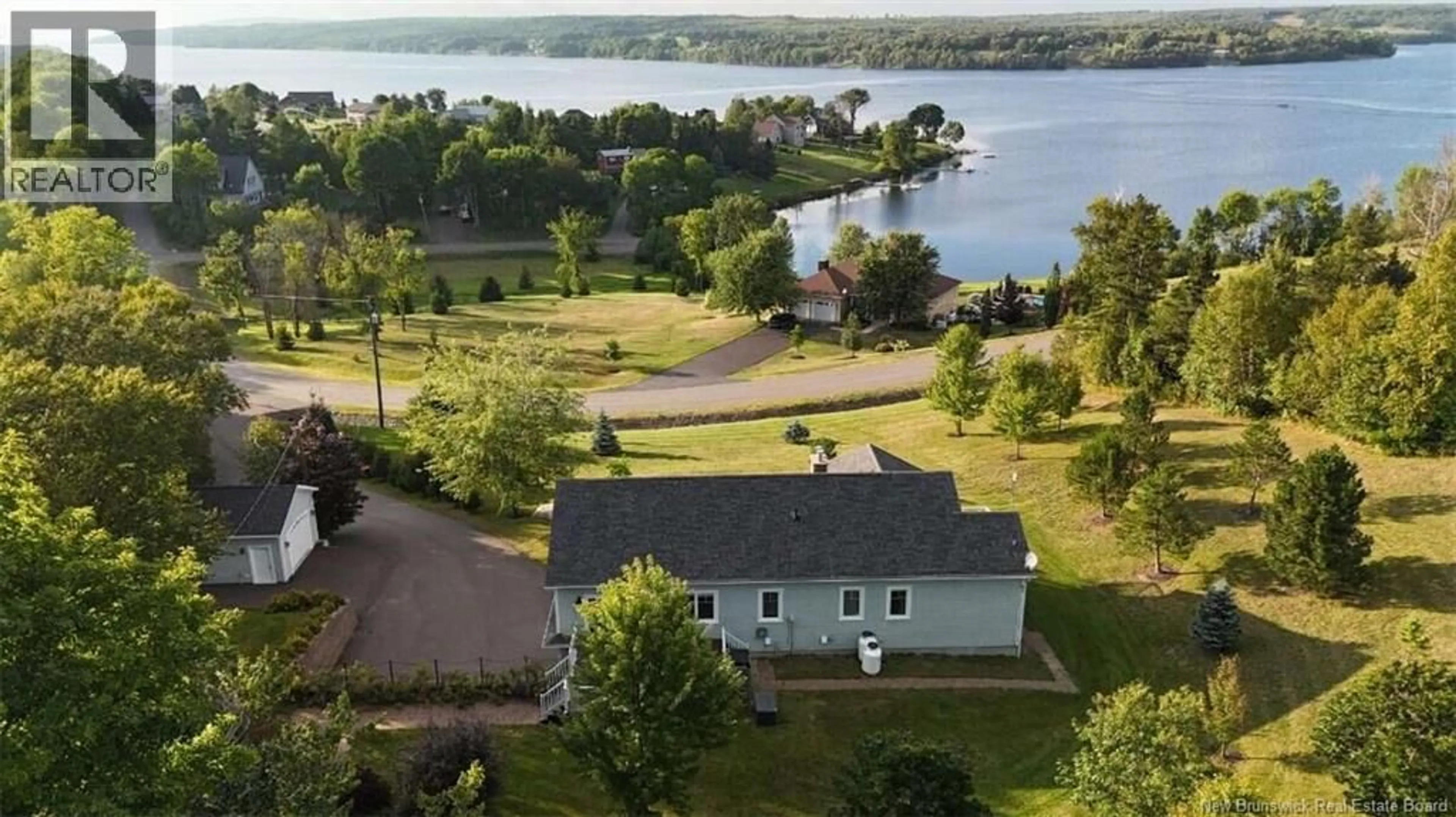 A pic from outside/outdoor area/front of a property/back of a property/a pic from drone, water/lake/river/ocean view for 20 HEADLAND ROAD, Upper Kingsclear New Brunswick E3E0E5