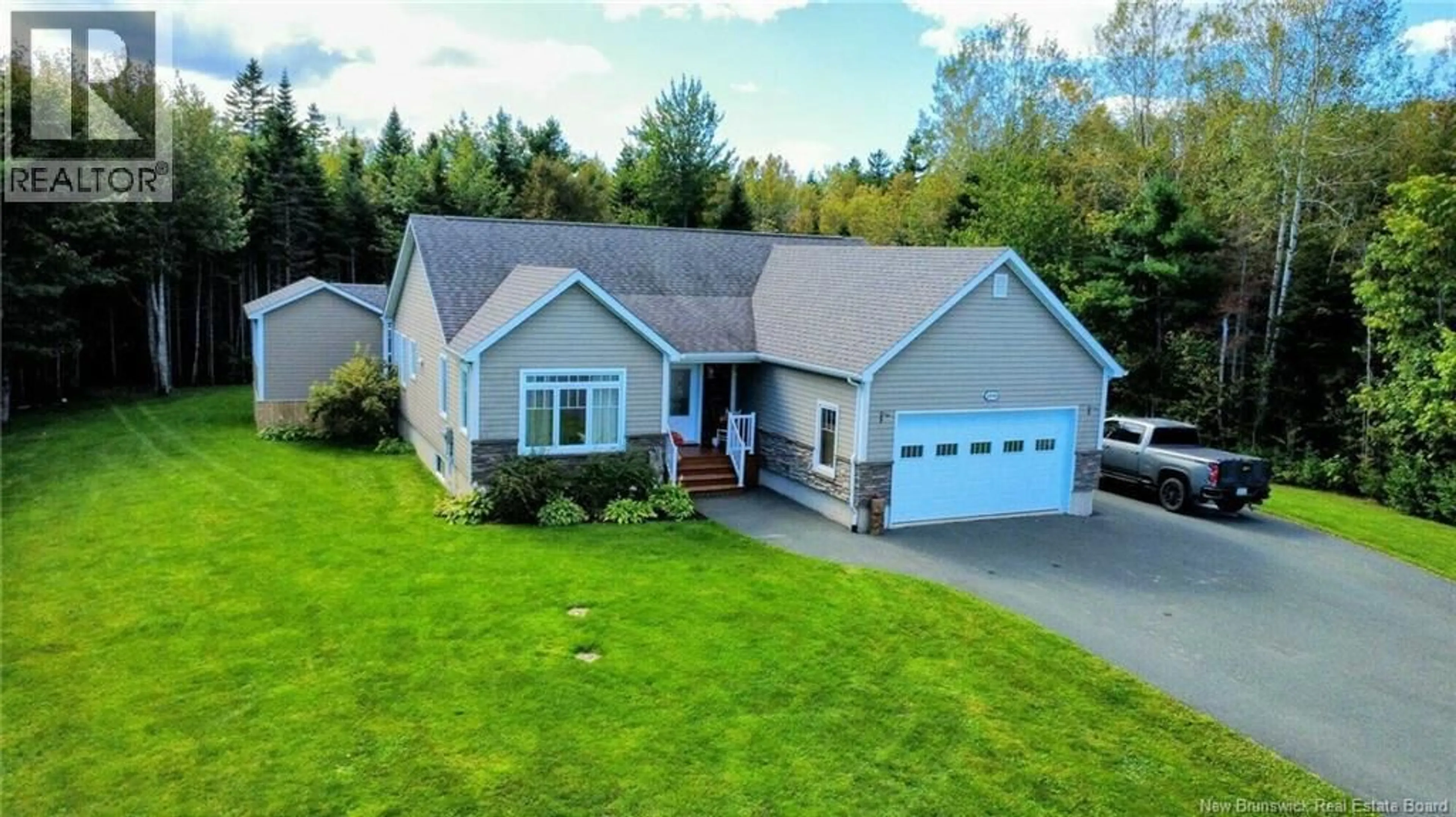 A pic from outside/outdoor area/front of a property/back of a property/a pic from drone, street for 1090 JESSIE STREET, Tracadie New Brunswick E1X0B2