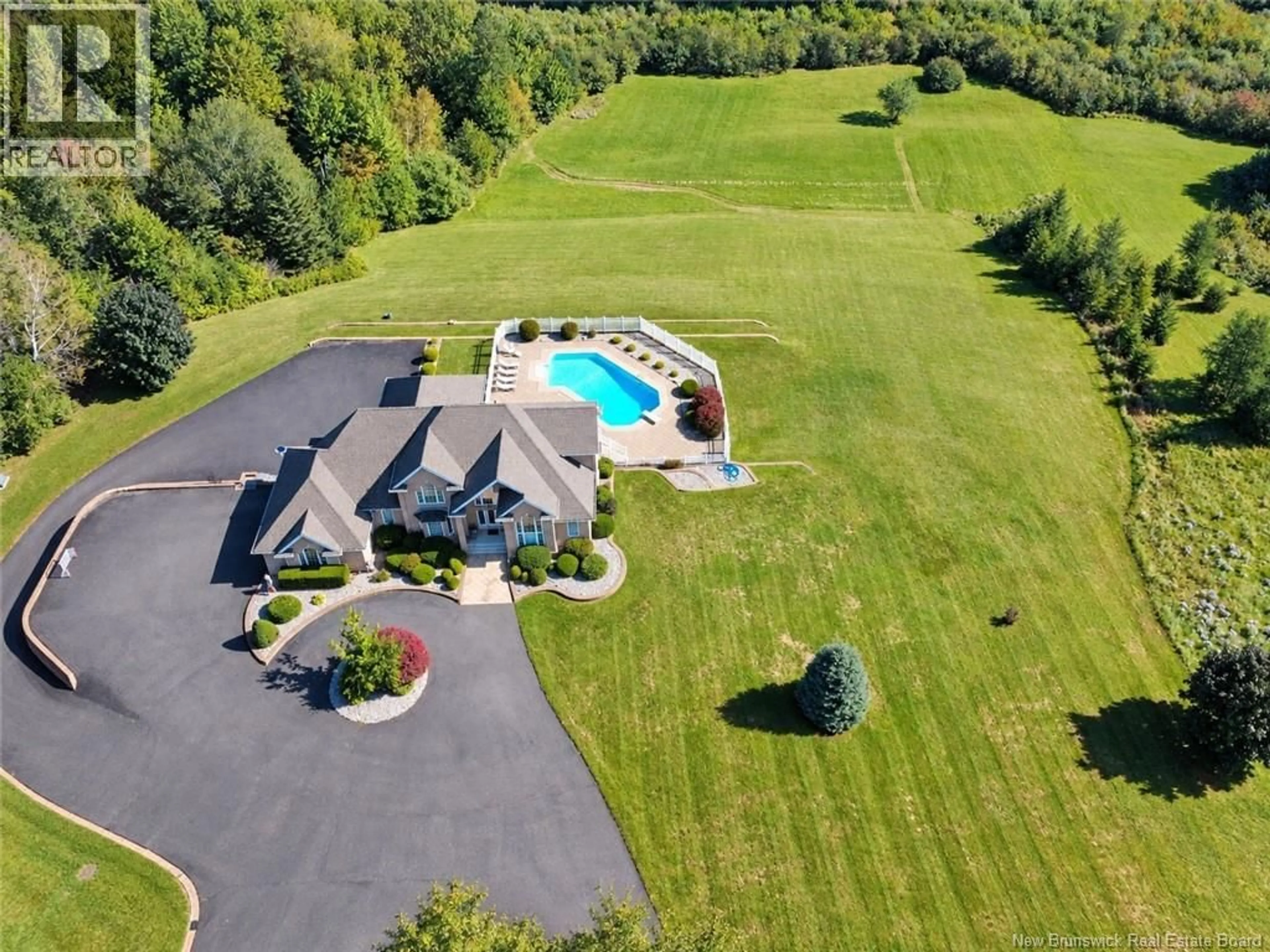 A pic from outside/outdoor area/front of a property/back of a property/a pic from drone, water/lake/river/ocean view for 6865 ROUTE 134, McIntosh Hill New Brunswick E4S4L3
